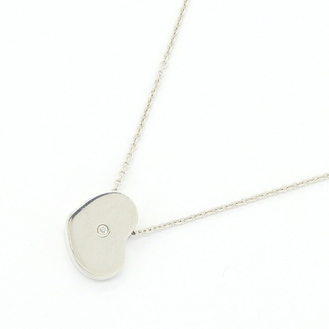 Tiffany & Co. Paloma Picasso Modern Heart Necklace with 1 Diamond, Sterling Silver 925, Single: --- Catalog ---Category: SizePendant Size: 12mm x 10mm / 0.47'' x 0.39''Neck Circumference: 41 cm / 16.14''Category: DesignGender: WomenMaterial: Sterling silver 925Pendant Type: PendantNecklace Type: