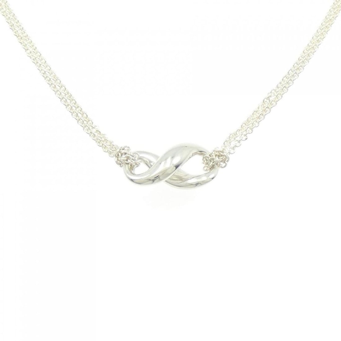 Tiffany & Co. Figure Eight Necklace: --- Catalog ---Category: SizePendant Size: 9.1mm x 9.1mm / 0.35'' x 0.35''Neck Circumference: 40 cm / 15.74''Category: DesignColor: SilverGender: WomenMaterial: Silver 925Necklace Type: