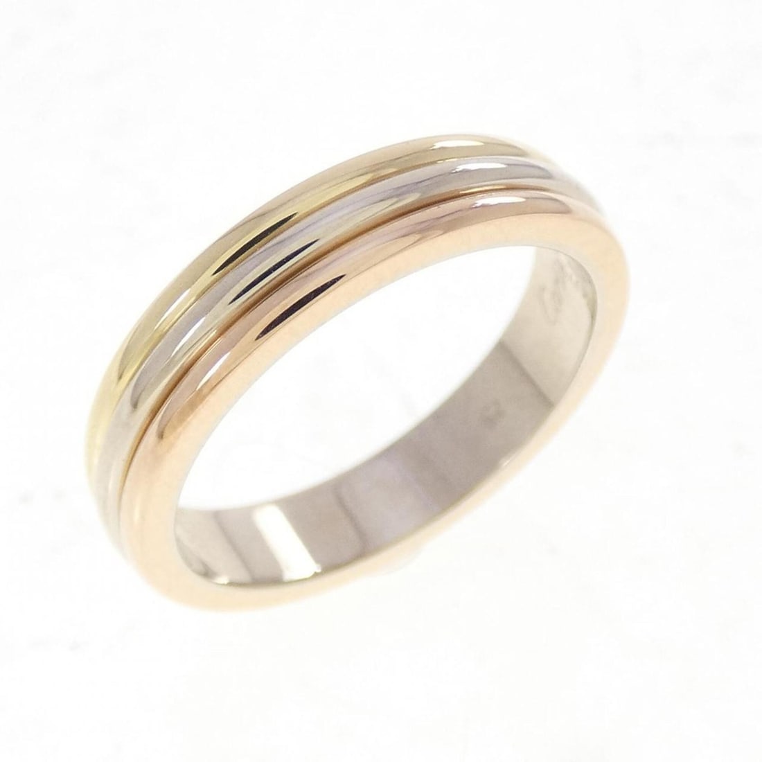 Cartier Three Gold Wedding Ring: --- Catalog ---Category: SizeUS Size: 5.5Brand Size: 50Category: DesignType: Wedding ringColor: Pink gold, White gold, Yellow goldGender: WomenMaterial: Pink gold (18K), White gold (18K), Yellow gold 