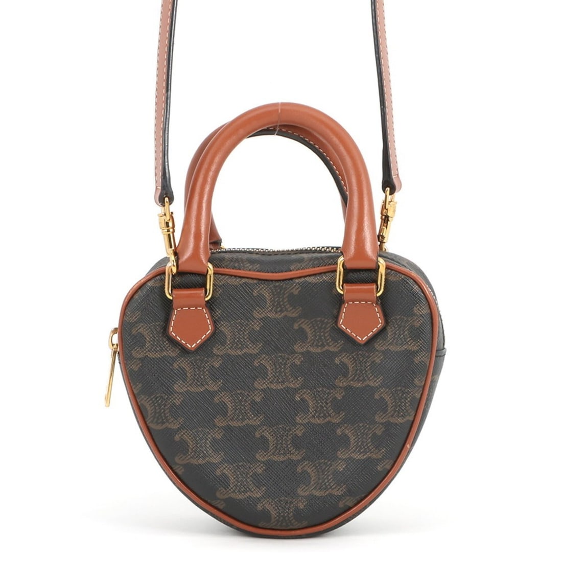 Celine Triomphe Heart Leather Handbag 198222 CELINE 2-way Shoulder Bag Brown: --- Catalog ---Category: SizeSize (HxWxD): 12.5cm x 14.5cm x 5cm / 4.92'' x 5.7'' x 1.96''Category: DesignType: Handbag, Shoulder bagColor: BrownGender: WomenMaterial: PVC , Leather Hardware Color: Go