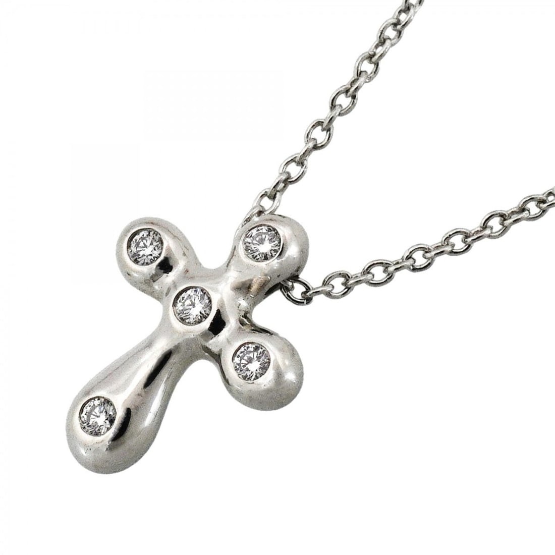 Tiffany & Co. Small Cross Necklace, 5PD (Pt950) Platinum, Diamond, Ladies' Necklace: --- Catalog ---Category: SizePendant Size: 11.9mm x 9.4mm / 0.46'' x 0.37''Neck Circumference: 45.5 cm / 17.91''Category: DesignStone: DiamondGender: WomenMaterial: Platinum 950Necklace Type: Necklace