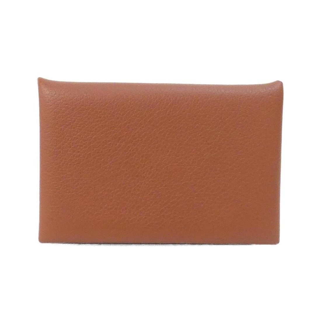 Hermes Calvi 064954CK Business Card Holder/Card Case: --- Catalog ---Category: DesignType: Business card caseColor: BriqueGender: Women,MenCategory: GeneralBrand: HermesCategory: Physical PropertiesSize (HxWxD): 7cm x 10.5cm x 1.5cm / 2.75'' x 4.13'' x
