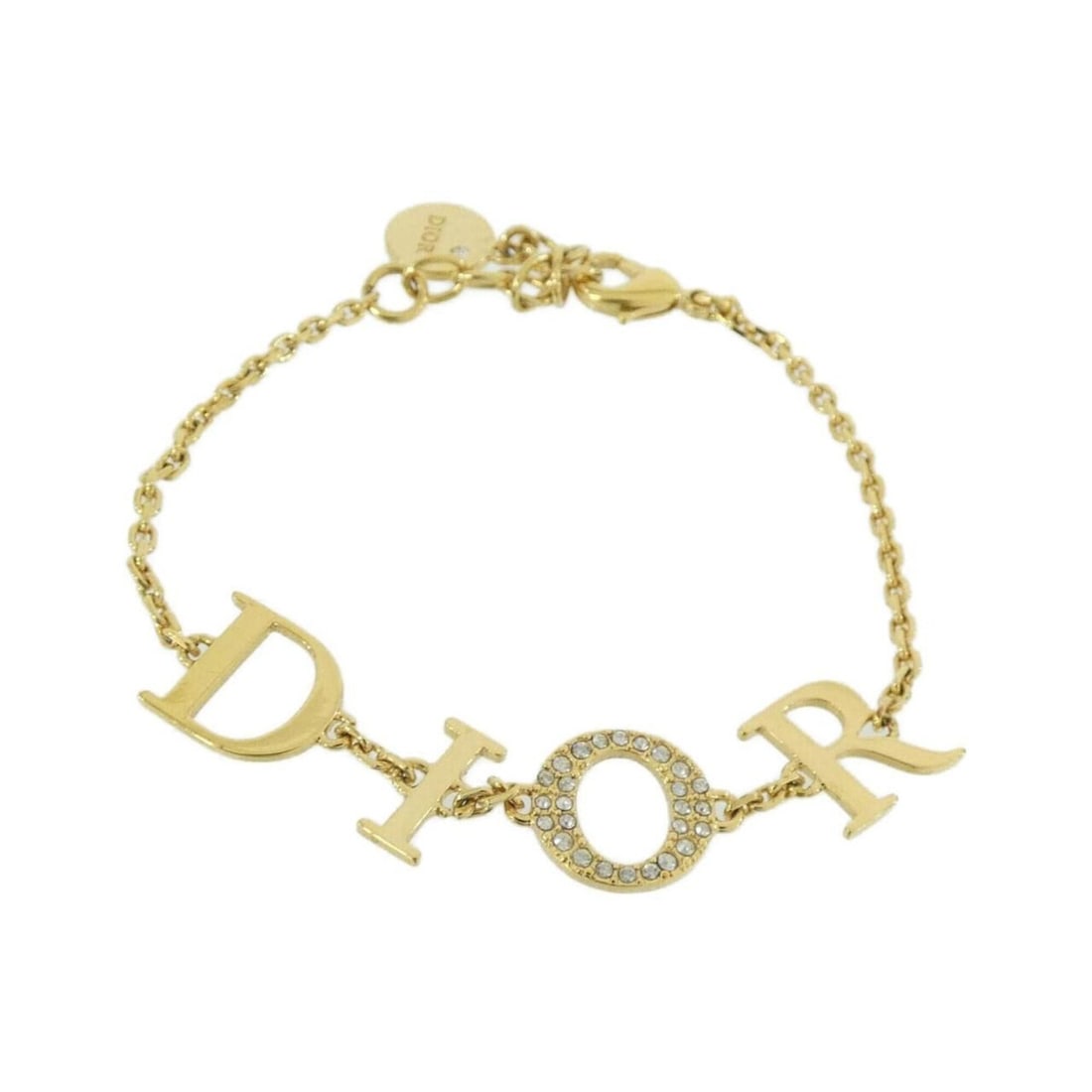 Christian Dior Revolution B1244DVOCY Bracelet: --- Catalog ---Category: SizeLength: 16cm - 19cm / 6.29'' - 7.48''Category: DesignType: Charm braceletColor: Clear, GoldGender: WomenCategory: GeneralMPN: B1244DVOCYBrand: Christian Dior--- Item List 