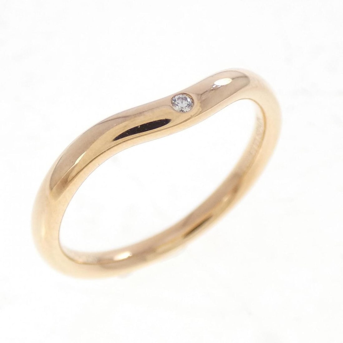 Tiffany & Co. Curved 1P Ring: --- Catalog ---Category: SizeJP Size: 9.0US Size: 5Category: DesignType: Band ringStone: DiamondGender: WomenMaterial: Pink gold (18K)Category: GeneralMPN: 13363505Brand: Tiffany--- Item List