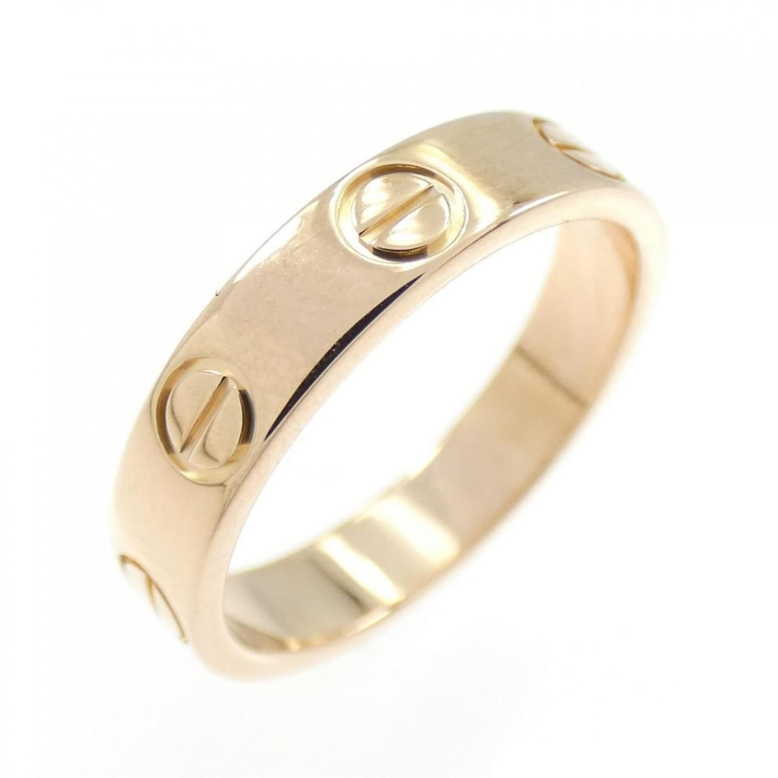 Cartier Mini Love Ring: --- Catalog ---Category: SizeUS Size: 4Brand Size: 47Category: DesignType: Band ringGender: WomenMaterial: Pink gold (18K)Category: GeneralBrand: Cartier--- Item List ---Section: ConditionRanking: