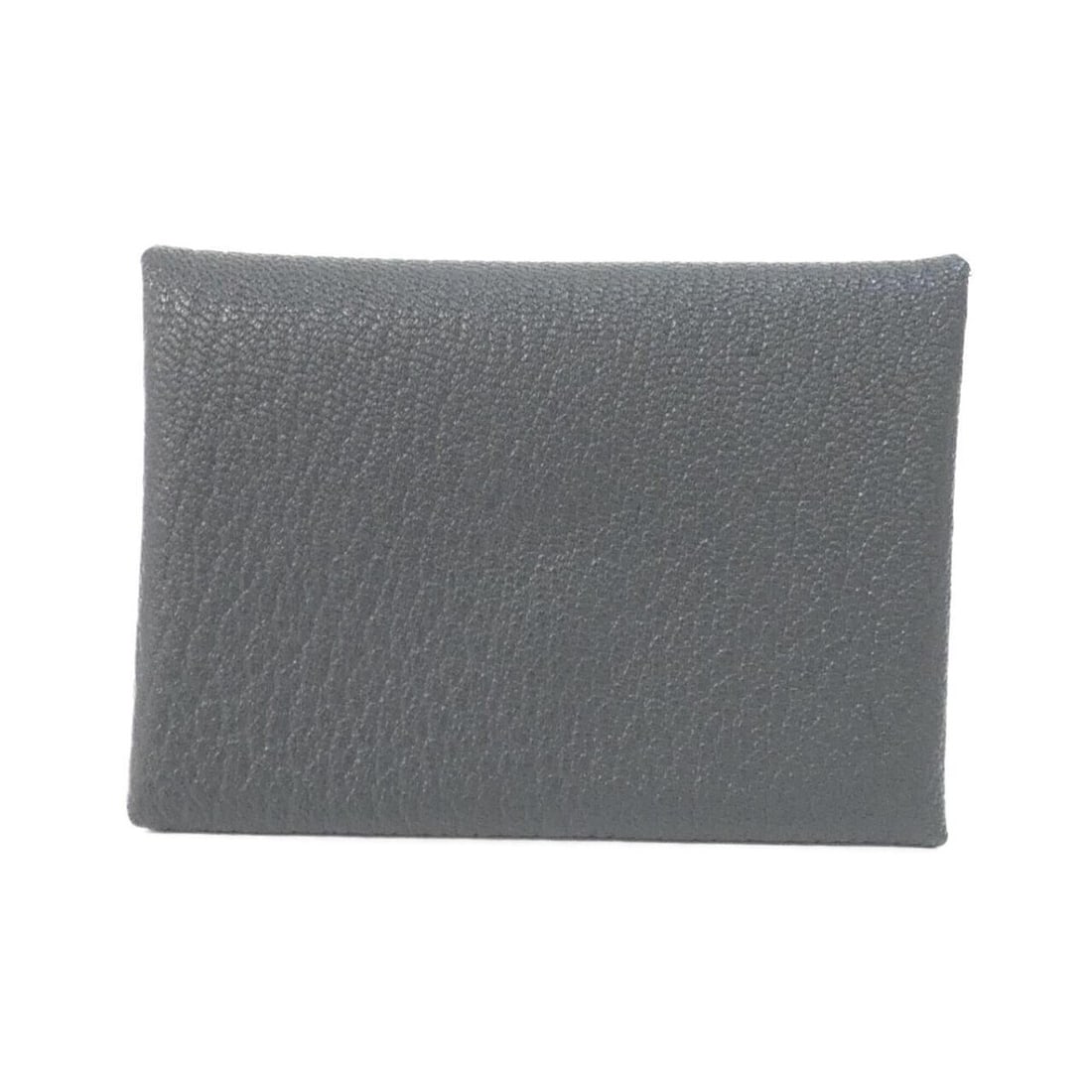 Hermes Calvi Duo Verso 083038CK Wallet/Coin Case: --- Catalog ---Category: SizeSize (HxWxD): 7cm x 10.5cm x 1.5cm / 2.75'' x 4.13'' x 0.59''Category: DesignType: Coin purse/coin caseColor: BlackGender: WomenMaterial: Chevre leather Category: