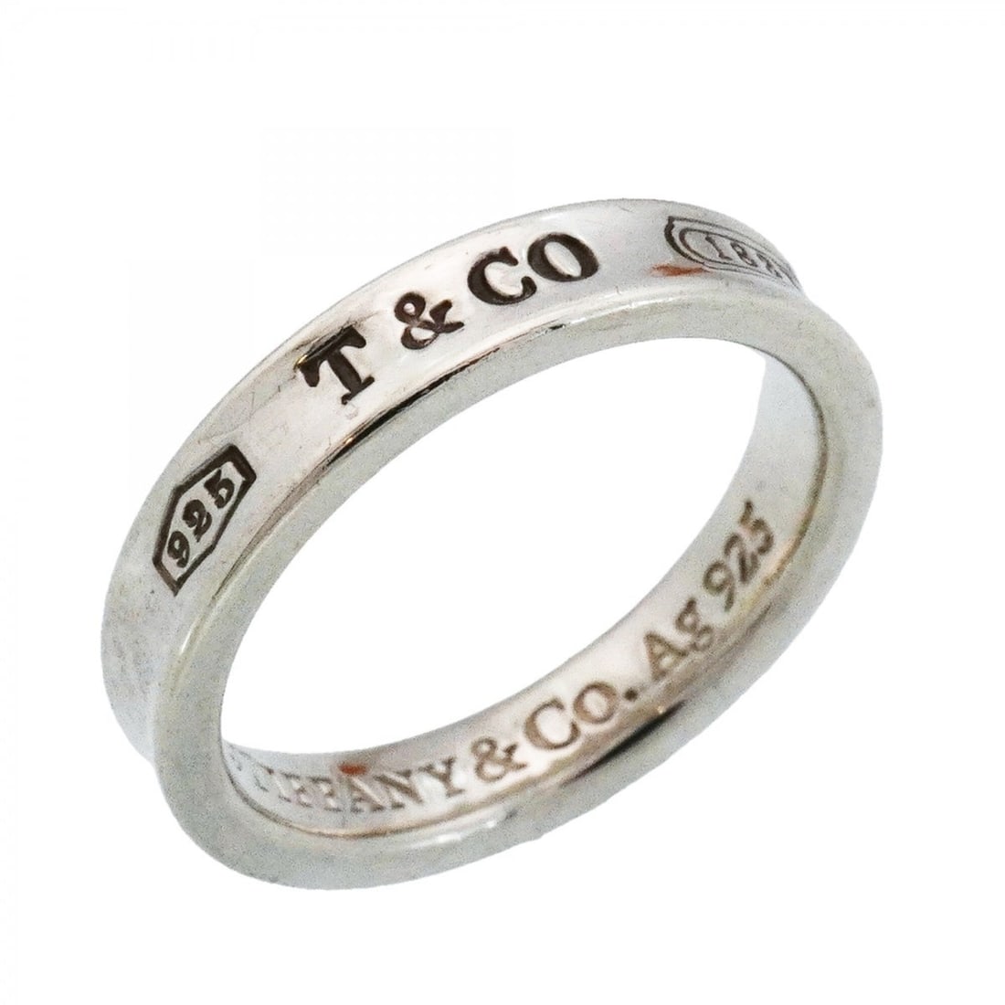 Tiffany & Co. Narrow Ring, Sterling Silver 925, Size 10, Women's: --- Catalog ---Category: SizeJP Size: 10US Size: 5.5Category: DesignType: Band ringGender: WomenMaterial: Silver 925Category: GeneralBrand: Tiffany--- Item List ---Section: ConditionRanking: Rank AB U