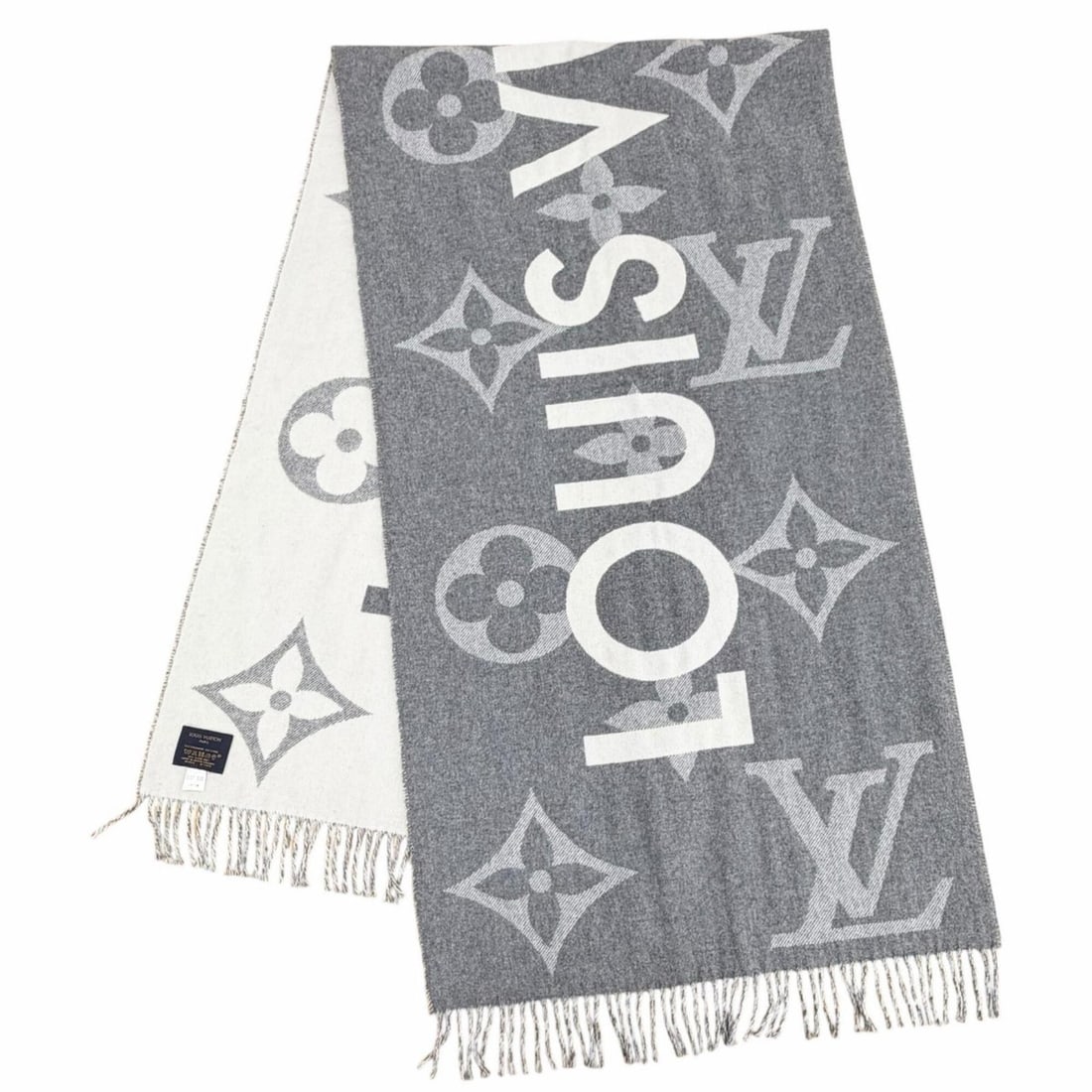 LOUIS VUITTON M73455 Echarpe Monogram Capital Cashmere Wool Fringe Scarf, Gray/Off-White, Made in: --- Catalog ---Category: SizeSize (LxW): 1.8m x 51cm / 70.86'' x 20.07''Category: DesignType: StoleColor: Gray, Off-whiteGender: WomenMaterial: Cashmere 52%, Wool 48%Category: GeneralBrand: Louis Vuit