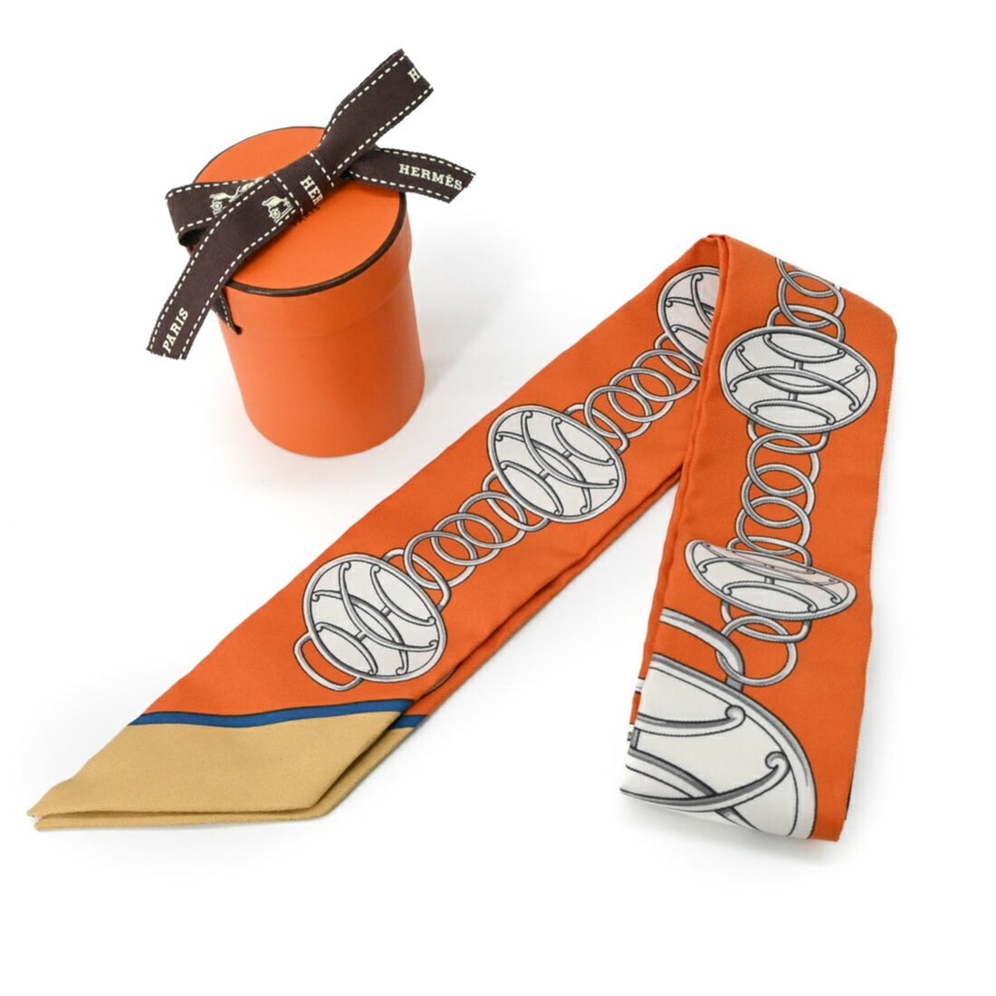 HERMES Twilly LIFT PROFILE Scarf/Muffler, Orange: --- Catalog ---Category: SizeSize (LxW): 85cm x 5cm / 33.46'' x 1.96''Category: DesignType: ScarfColor: OrangeGender: WomenMaterial: Silk Category: GeneralBrand: Hermes--- Item List ---Section: Condit