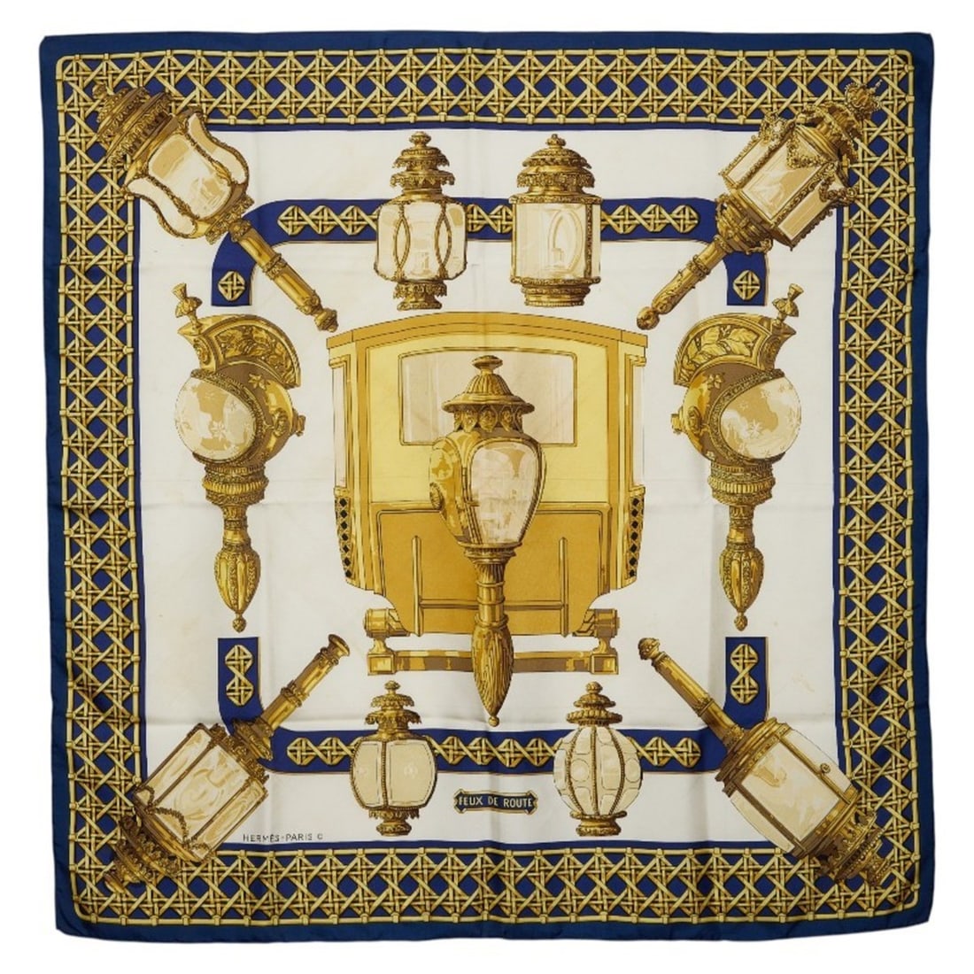 Hermes Carre 90 Feux de Route Carriage Lantern Scarf Muffler Navy Ivory Gold Silk Women's HERMES: --- Catalog ---Category: SizeSize (LxW): 88cm x 89cm / 34.64'' x 35.03''Category: DesignType: ScarfColor: Gold, Ivory, NavyGender: WomenMaterial: Silk Category: GeneralBrand: Hermes--- Item List
