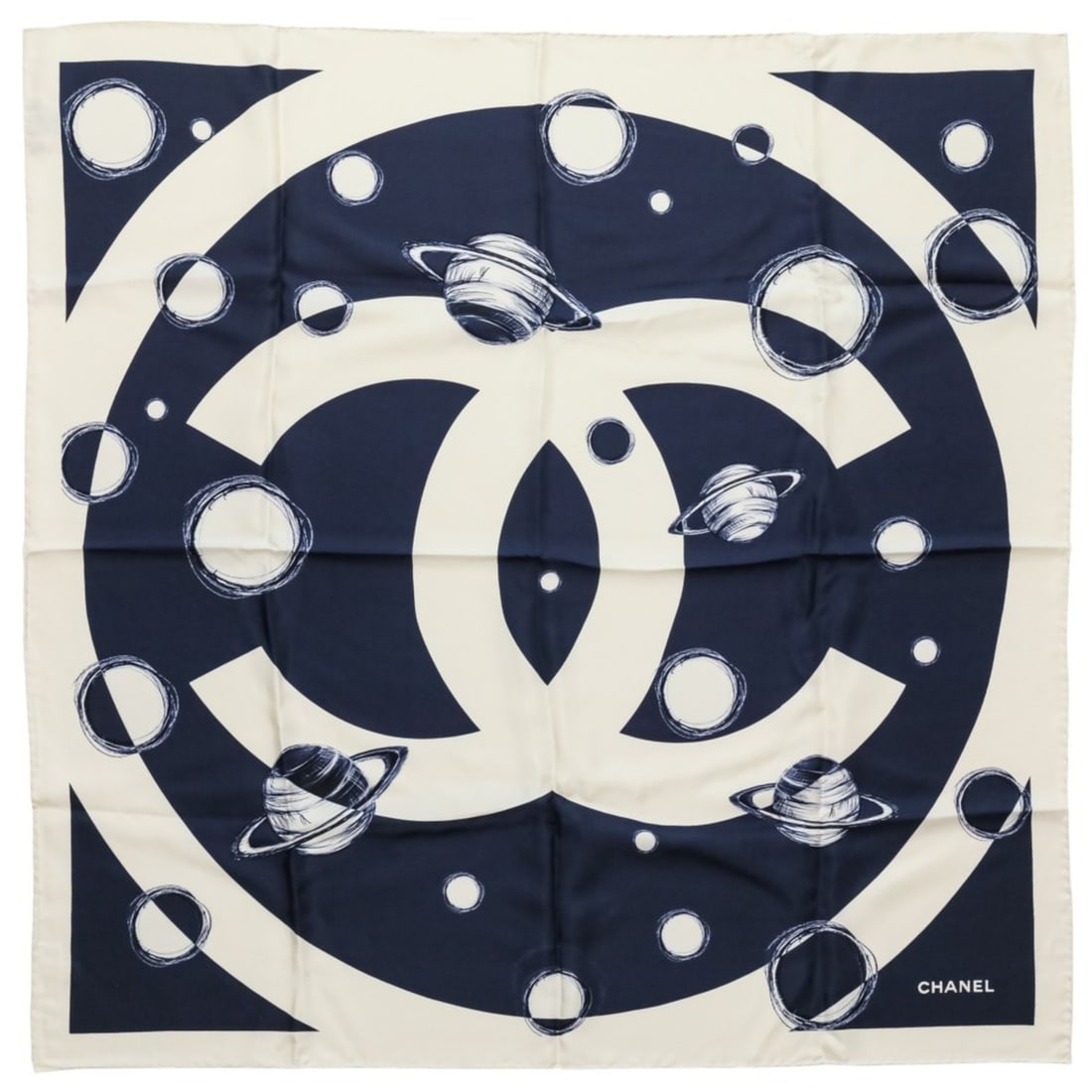 CHANEL 17K Coco Mark Planet Silk Scarf/Muffler, Ivory/Navy, Women's: --- Catalog ---Category: SizeSize (LxW): 87.5cm x 87.5cm / 34.44'' x 34.44''Category: DesignType: ScarfColor: Ivory, NavyGender: WomenMaterial: Silk Category: GeneralBrand: Chanel--- Item List ---Sect