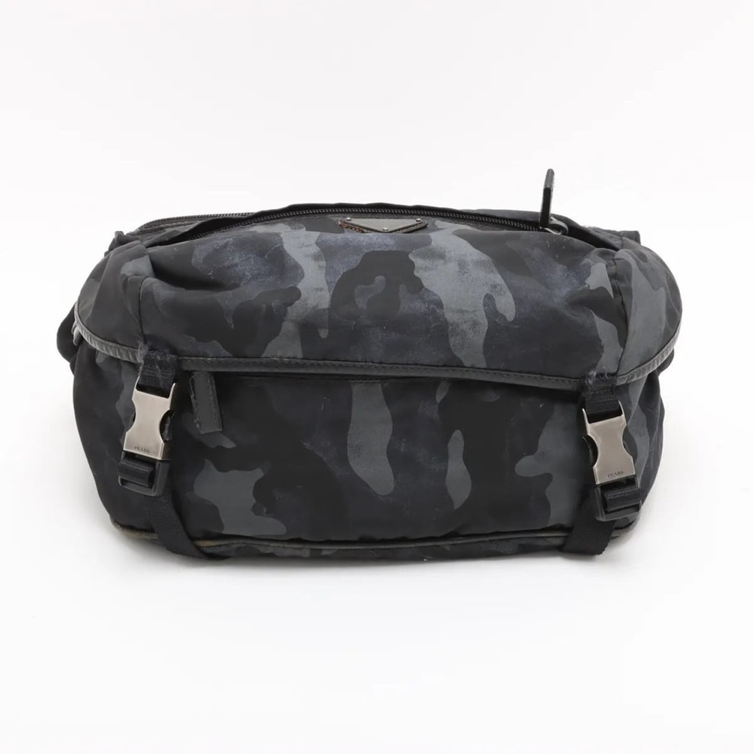 Prada Tessuto Nylon Camouflage 2-Way Body Bag (VA0994) with Guarantee Card - Men's: --- Catalog ---Category: SizeSize (HxWxD): 15cm x 32cm x 16cm / 5.9'' x 12.59'' x 6.29''Category: DesignType: Sling bagColor: BlackGender: MenMaterial: Nylon , Leather Category: GeneralBrand: Prada---