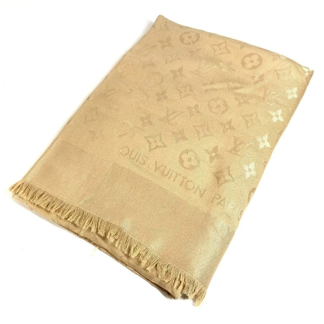 LOUIS VUITTON Monogram Large Apparel Accessory Stole Fringe Scarf Shawl Wool Silk Men's Women's: --- Catalog ---Category: SizeSize (LxW): 1.42m x 1.42m / 55.9'' x 55.9''Category: DesignType: StoleColor: BeigeGender: Men,Women,UnisexMaterial: Wool , Silk Category: GeneralLine: MonogramBrand: