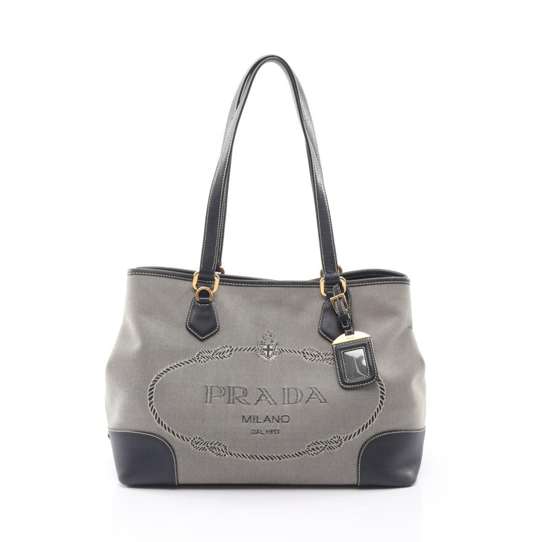 Prada logo jacquard triangular plate tote bag/handbag, canvas and leather, women's, beige/navy.: --- Catalog ---Category: SizeSize (HxWxD): 25cm x 34cm x 14cm / 9.84'' x 13.38'' x 5.51''Category: DesignType: Handbag, Tote bagColor: Beige, NavyGender: WomenMaterial: Canvas , Leather Category: Gene