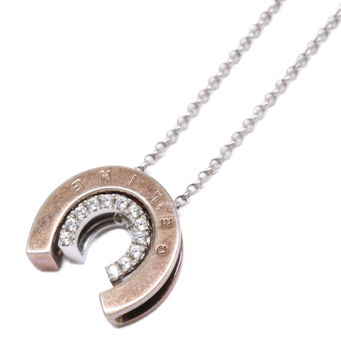 CELINE Silver 925 Rhinestone Horseshoe Necklace for Women: --- Catalog ---Category: SizePendant Size: 14mm x 13mm / 0.55'' x 0.51''Neck Circumference: 43 cm / 16.92''Category: DesignColor: SilverGender: WomenMaterial: SilverNecklace Type: NecklaceCategory: Ge