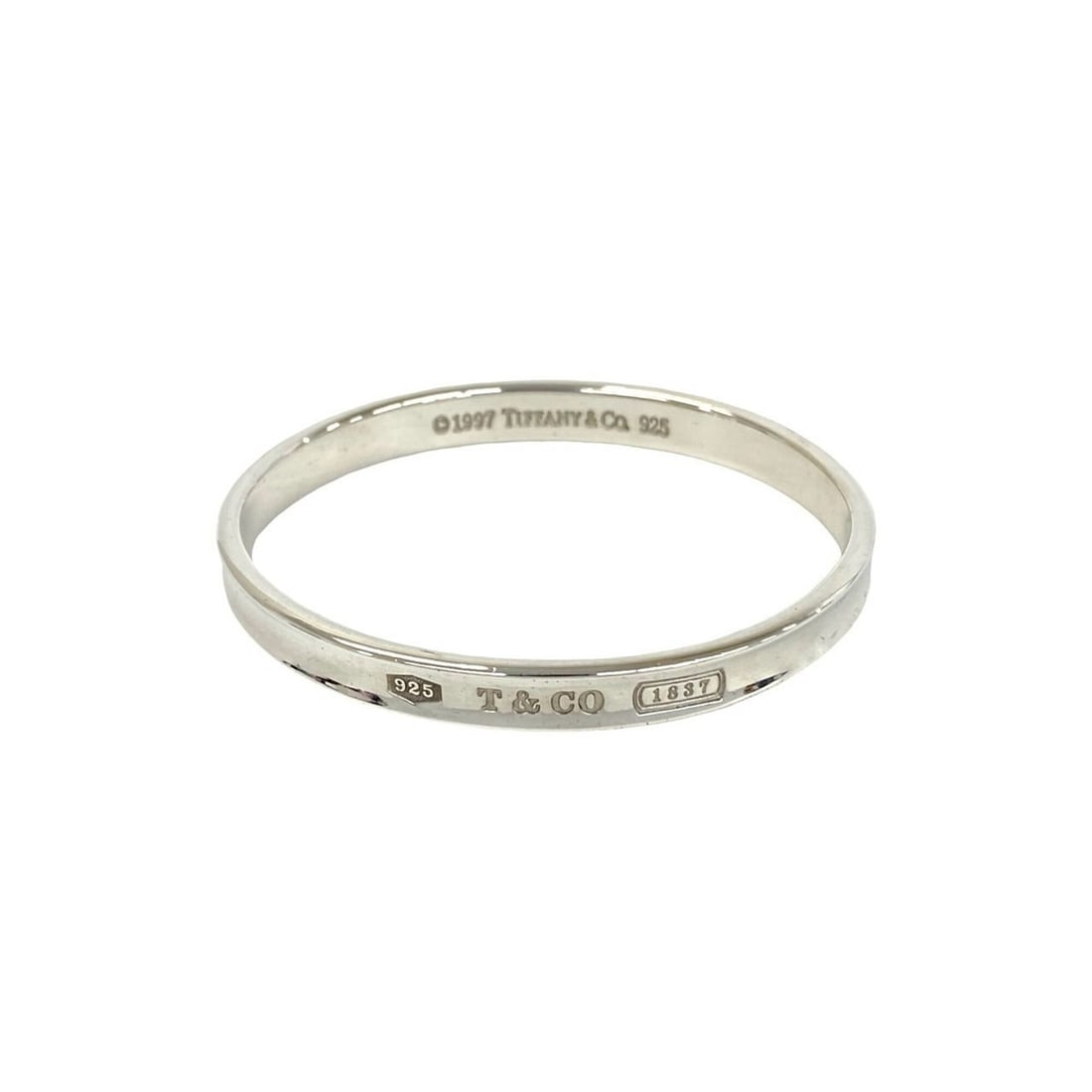 TIFFANY&Co. Tiffany Narrow Bangle, Sterling Silver 925 Bracelet, Accessory, 75070: --- Catalog ---Category: SizeLength: 18cm / 7.08''Category: DesignType: BangleColor: SilverGender: WomenMaterial: Silver 925Category: GeneralBrand: Tiffany--- Item List ---Section: ConditionRanking: R