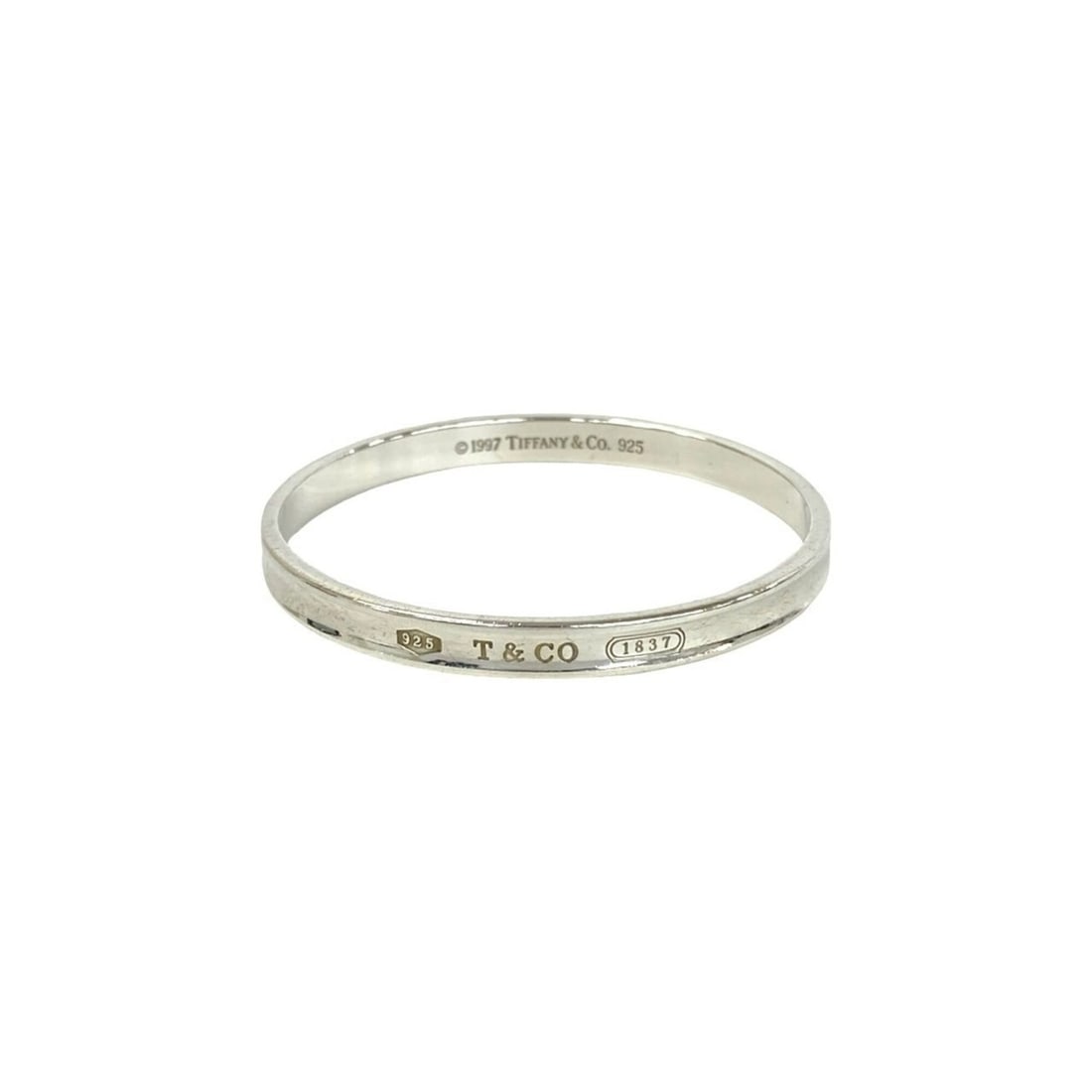 TIFFANY&Co. Tiffany Narrow Bangle, Sterling Silver 925 Bracelet, Accessory, 53665: --- Catalog ---Category: SizeLength: 18.5cm / 7.28''Category: DesignType: BangleColor: SilverGender: WomenMaterial: Silver 925Category: GeneralBrand: Tiffany--- Item List ---Section: ConditionRanking: