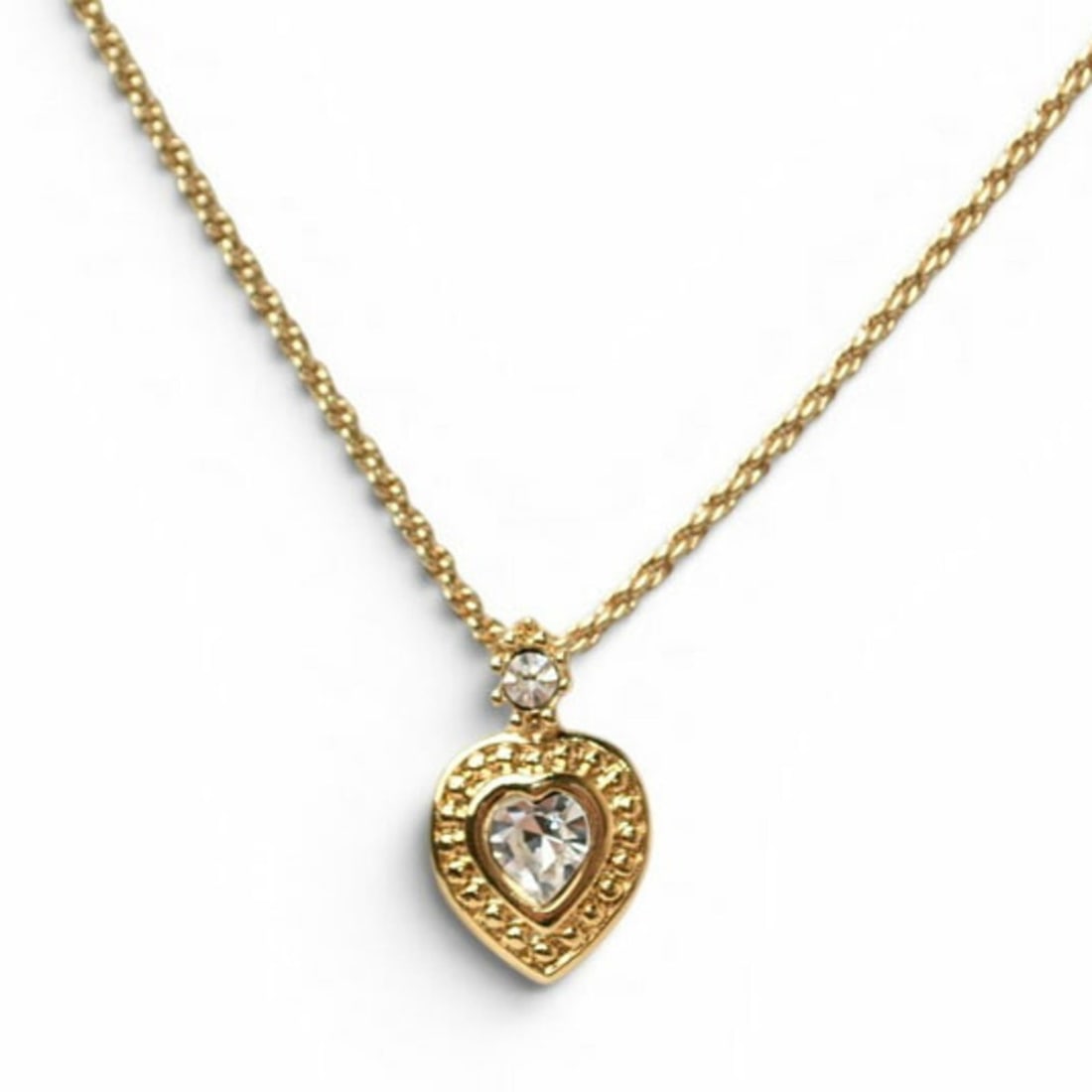 Christian Dior Necklace Choker with Heart Motif and Rhinestones, Gold: --- Catalog ---Category: SizePendant Size: 20mm x 12mm / 0.78'' x 0.47''Neck Circumference: 38 cm - 42 cm / 14.96'' - 16.53''Category: DesignColor: GoldGender: Women,MenMaterial: Gold plating, Rhinest