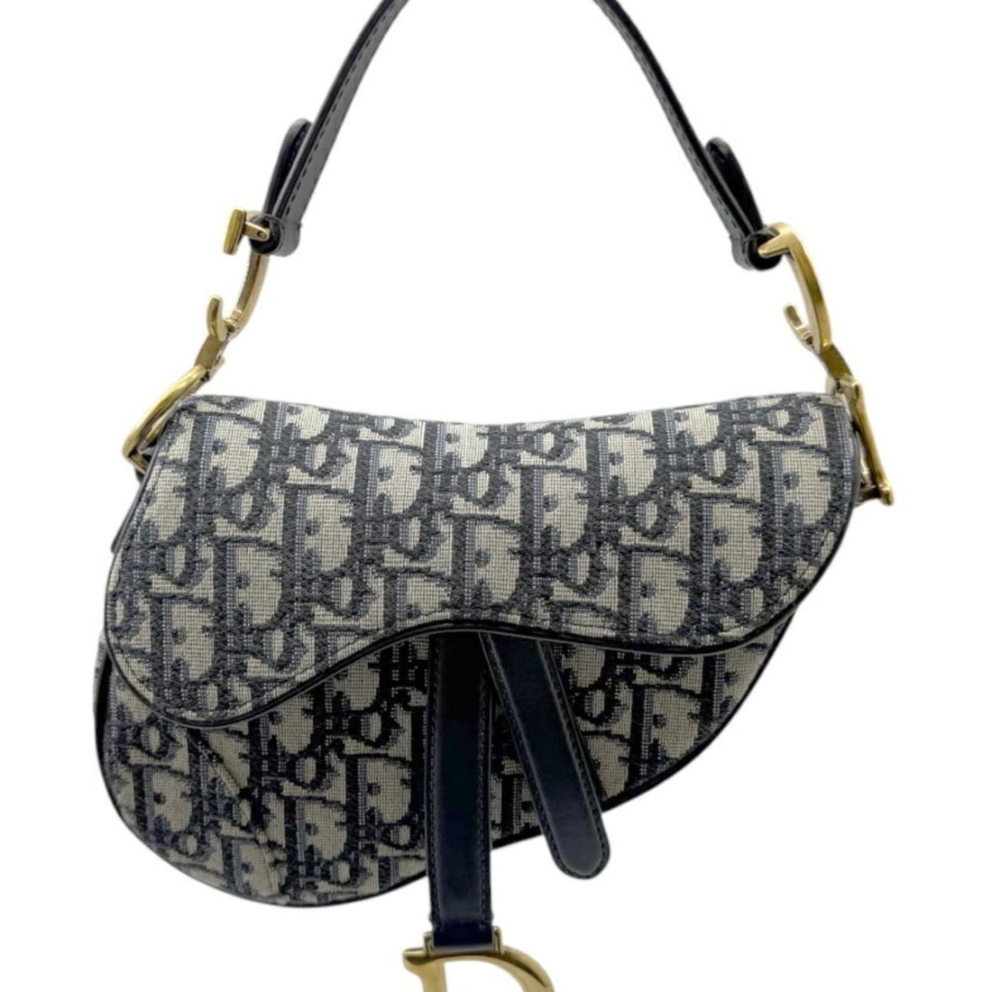 Christian Dior Saddle Bag Trotter Canvas Navy Leather Handbag for Women: --- Catalog ---Category: SizeSize (HxWxD): 15cm x 18cm x 4cm / 5.9'' x 7.08'' x 1.57''Category: DesignType: Handbag, Saddle bagColor: NavyGender: WomenMaterial: Canvas , Leather Category: GeneralBrand