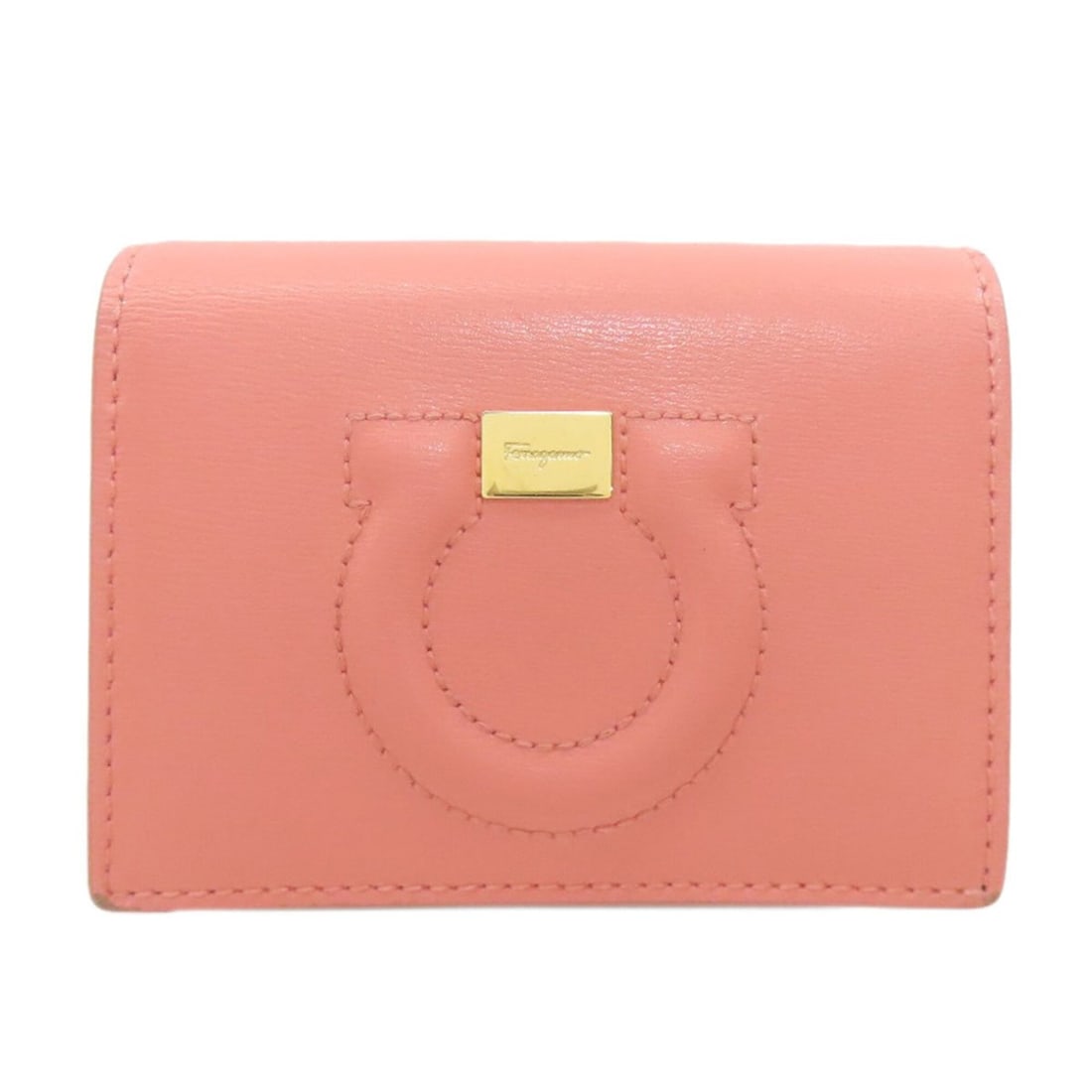 Salvatore Ferragamo Gancini hardware motif bi-fold leather wallet for women.: --- Catalog ---Category: SizeSize (HxWxD): 8.5cm x 11cm x 3cm / 3.34'' x 4.33'' x 1.18''Category: DesignType: Wallet (bi-fold)Color: PinkGender: WomenMaterial: Leather Category: GeneralBrand: Salvator