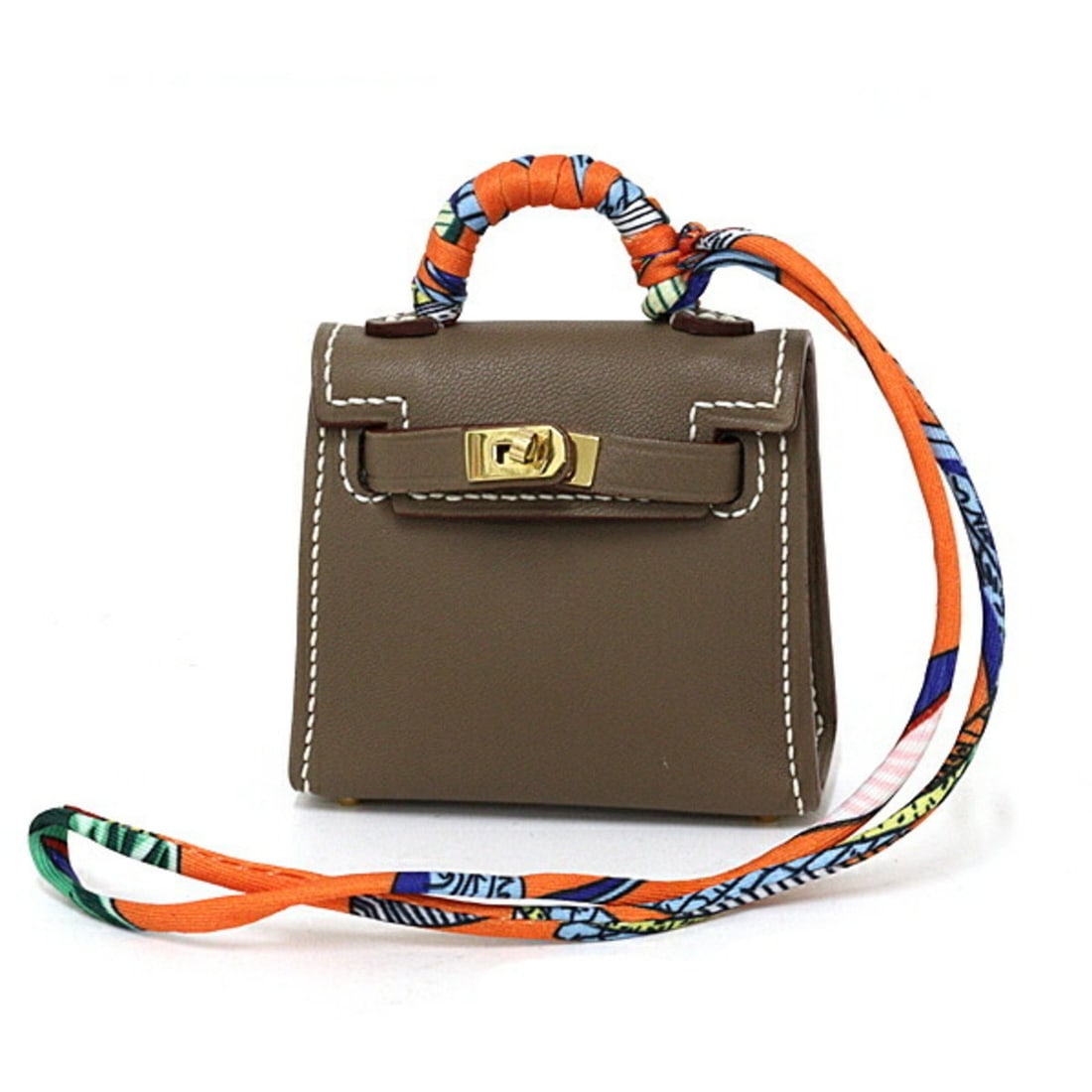 Hermes HERMES Charm "Kelly Twilly" Bag Twilly Scarf Tadelakt Etoupe A Stamp (2017): --- Catalog ---Category: SizeSize (HxWxD): 7.50mm x 6.50mm x 2.00mm / 0.30'' x 0.26'' x 0.08''Category: DesignType: Handbag charmColor: Etoupe gray, OrangeGender: Women,MenMaterial: Silk, Tadelakt lea