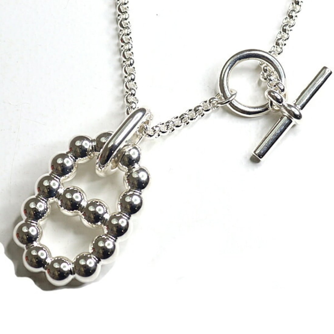 Hermes Chaine d'ancre Alea II GM pendant, silver (Ag925), unused.: --- Catalog ---Category: SizePendant Size: 33mm x 20.2mm / 1.29'' x 0.79''Neck Circumference: 70 cm / 27.55''Category: DesignColor: SilverGender: Men,WomenMaterial: Silver 925Pendant Type: PendantNeck