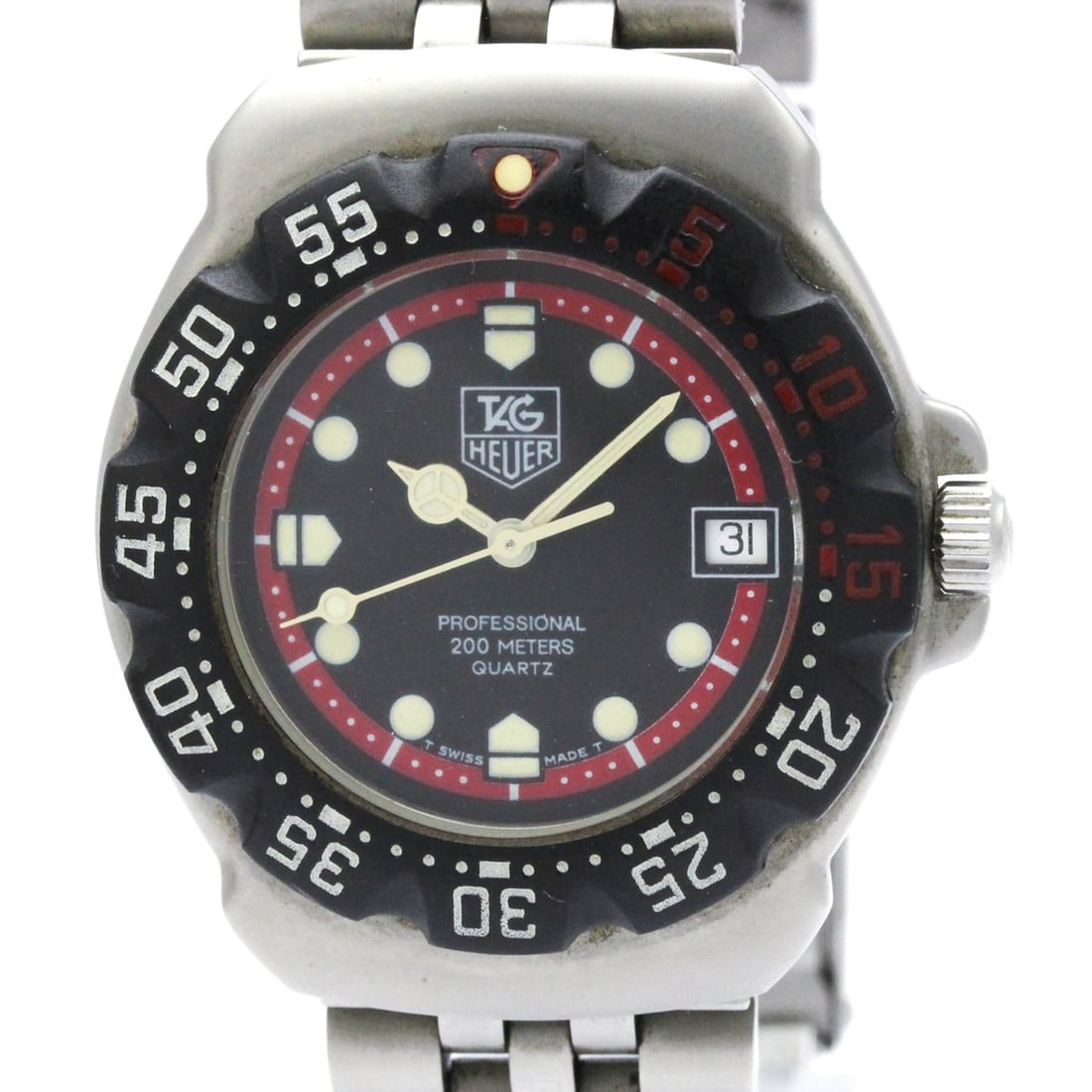 TAG HEUER Formula 1 Stainless Steel Quartz Mid Size Watch WA1210: --- Catalog ---Category: SizeCase Diameter: 33mm / 1.3''Category: DesignType: WristwatchStyle: SportGender: UnisexColor (Dial): BlackMaterial (Band): Stainless steelMaterial (Case): Stainless steelCat