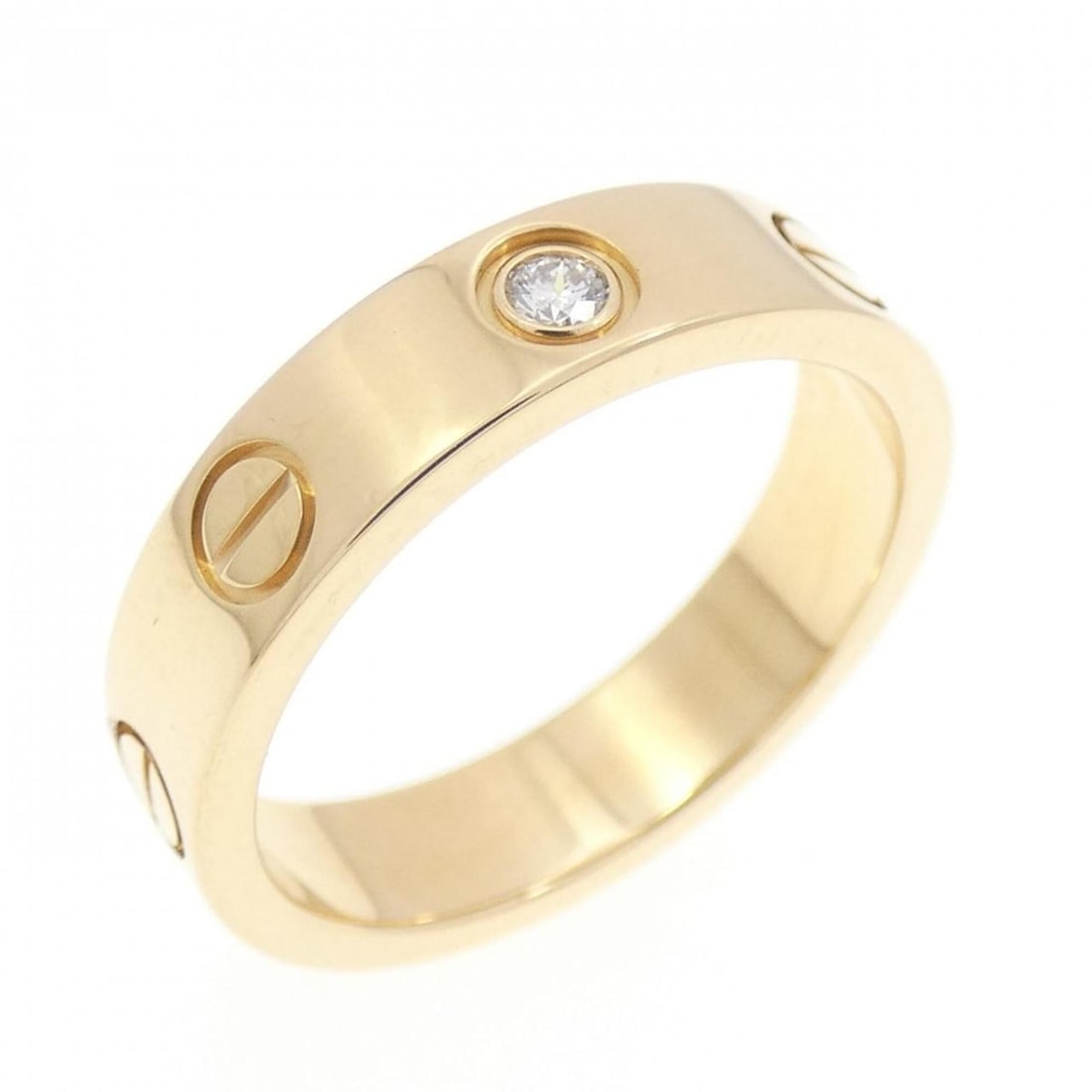 Cartier Mini Love 1P Ring: --- Catalog ---Category: SizeWidth: 3.9mm / 0.15''Weight: 4.1g / 0.14oz.JP Size: 7US Size: 4Category: DesignType: Band ringStone: DiamondGender: WomenMaterial: Yellow gold (18K)Category: GeneralLine: