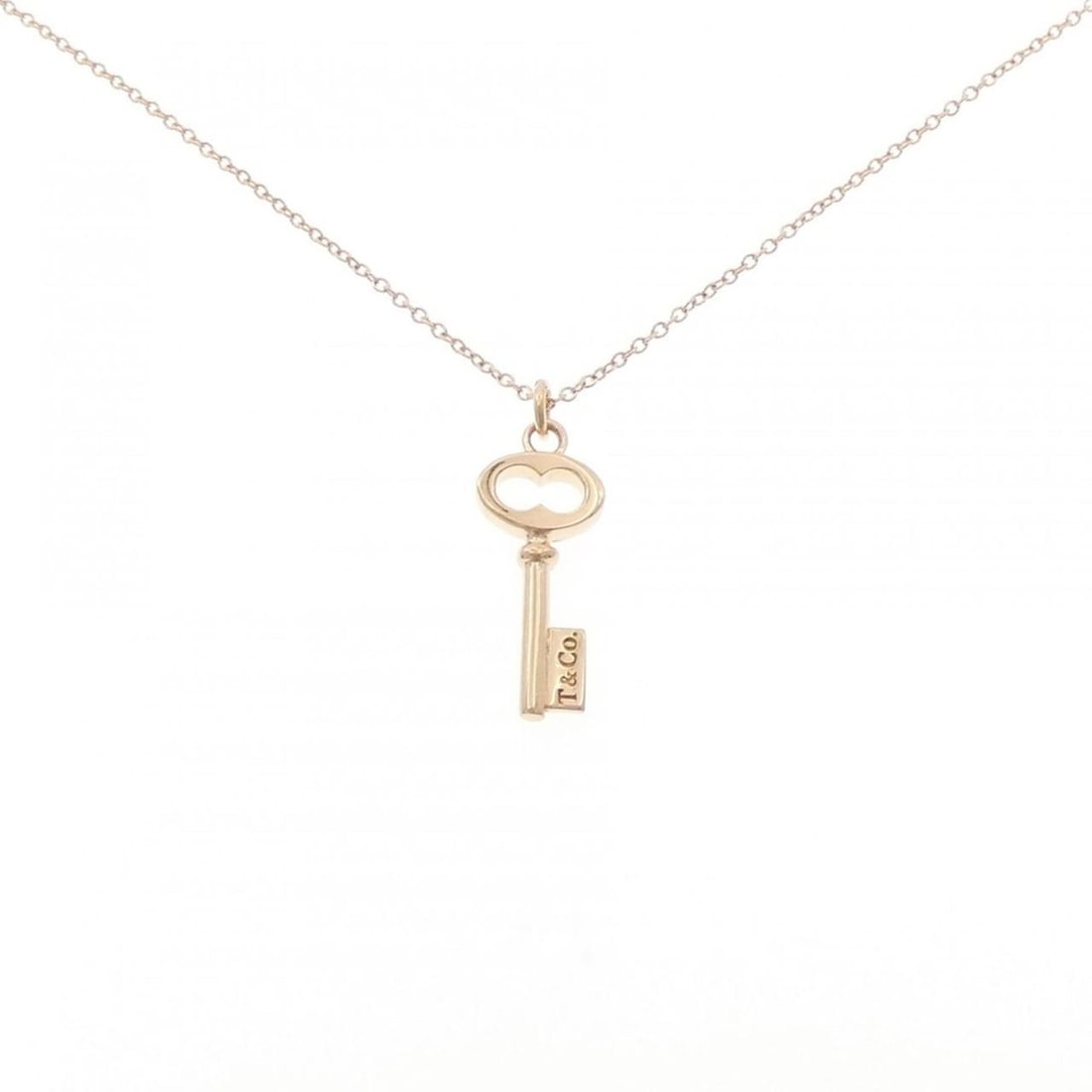 Tiffany Vintage Oval Key Mini Necklace: --- Catalog ---Category: SizePendant Size: 22.3mm x 8.2mm / 0.87'' x 0.32''Neck Circumference: 40 cm / 15.74''Category: DesignColor: Pink goldGender: WomenMaterial: Pink goldPendant Type: