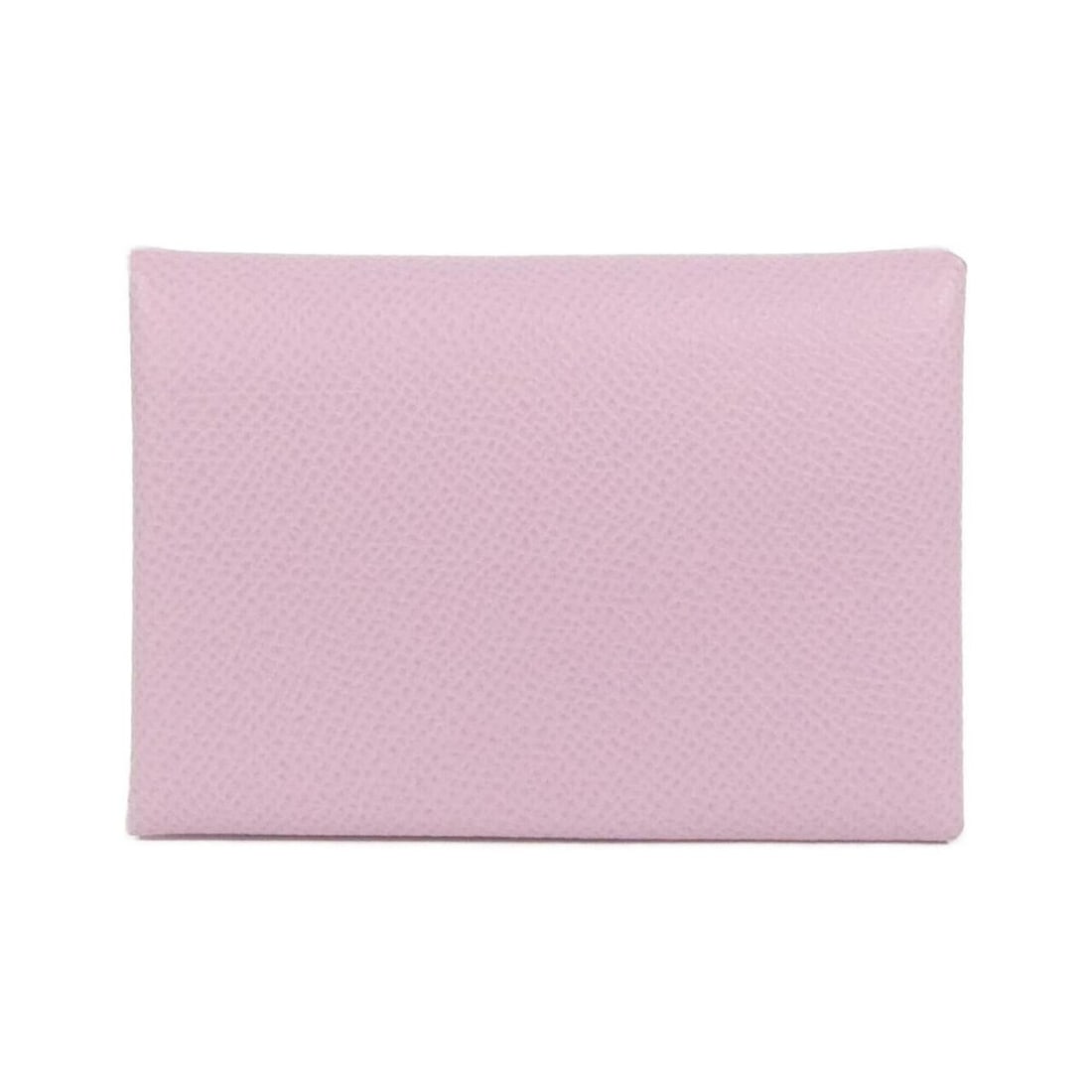 Hermes Calvi Duo 083035CK Wallet/Coin Case: --- Catalog ---Category: SizeSize (HxWxD): 7cm x 10.5cm x 1.5cm / 2.75'' x 4.13'' x 0.59''Category: DesignType: Coin purse/coin caseColor: PinkGender: WomenMaterial: Epsom leather Category: GeneralMPN