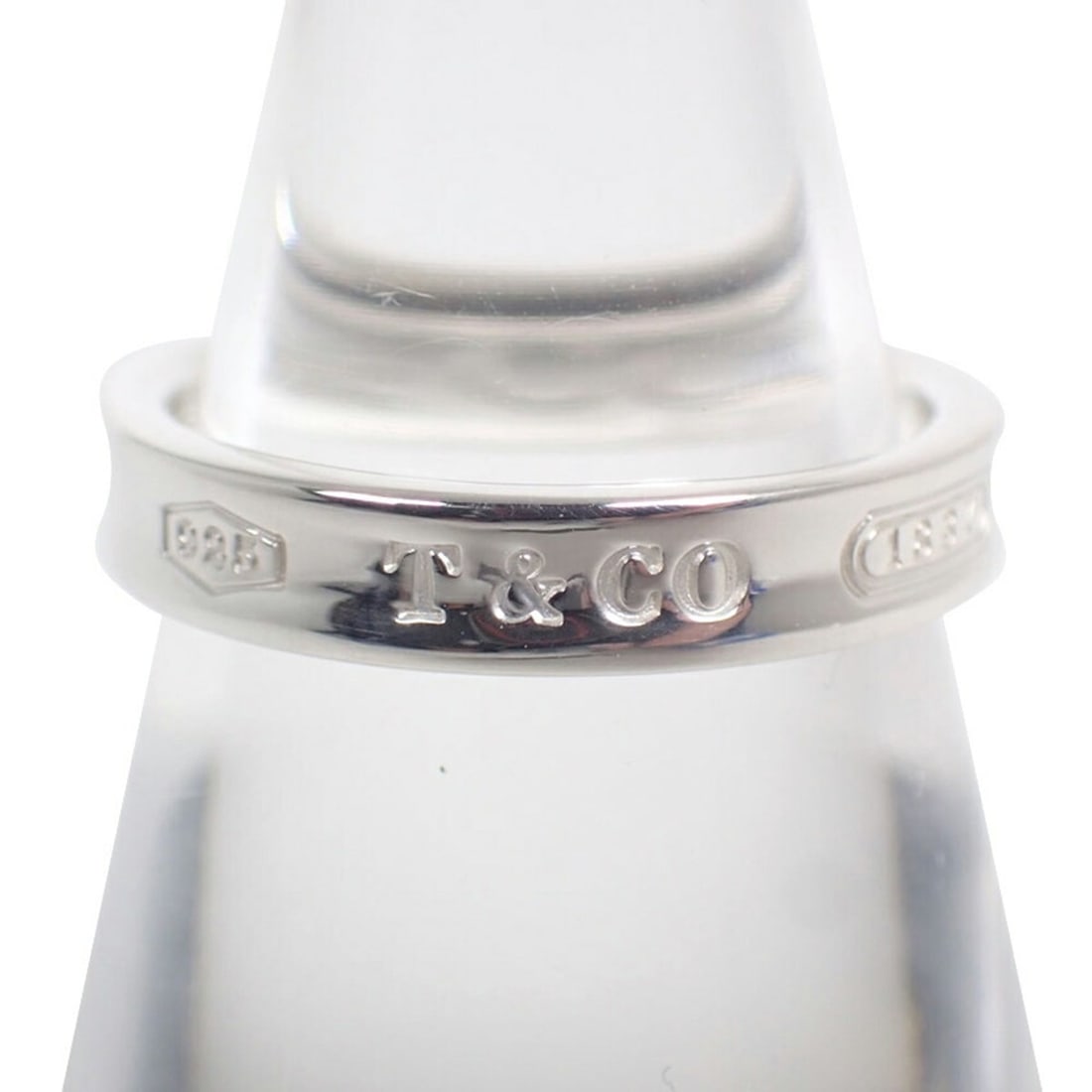 TIFFANY & Co. 925 1837 Narrow Ring, Size 10: --- Catalog ---Category: SizeUS Size: 5.5Brand Size: 50Category: DesignType: Band ringColor: SilverGender: WomenMaterial: Sterling silver 925Category: GeneralBrand: Tiffany--- Item List ---Section: Co