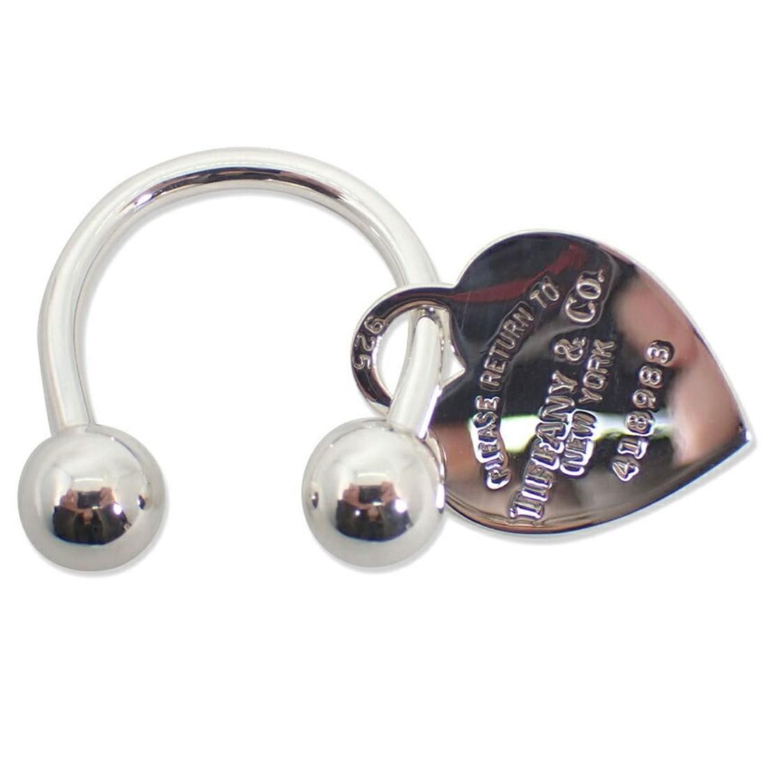 TIFFANY & Co. 925 Return to Tiffany Heart Tag Keyring: --- Catalog ---Category: SizeSize (HxWxD): 2.69cm x 2.04cm / 1.05'' x 0.8''Category: DesignType: KeyringColor: SilverGender: Women,MenMaterial: Sterling silver 925Category: GeneralBrand: Tiffany--- It
