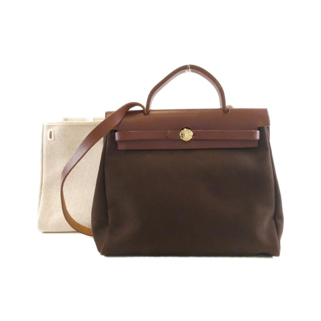 Hermes Herbag PM 044764CP Handbag: --- Catalog ---Category: SizeSize (HxWxD): 26cm x 30cm x 10cm / 10.23'' x 11.81'' x 3.93''Category: DesignType: HandbagColor: Ebene, HavaneGender: WomenMaterial: Toile H Category: GeneralMPN: