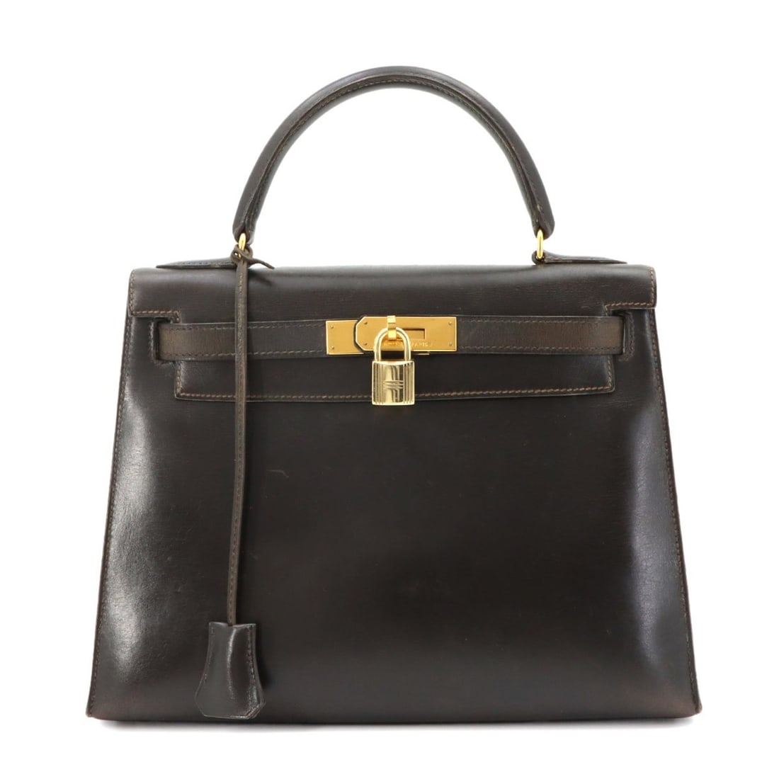 Hermes Kelly 28 Box Calf Brown Handbag, External Stitching, ?U Stamp, Made in 1991, Gold Hardware.: --- Catalog ---Category: SizeSize (HxWxD): 21cm x 29cm x 11cm / 8.26'' x 11.41'' x 4.33''Category: DesignType: HandbagColor: BrownGender: WomenMaterial: Box calf leather Category: GeneralBrand: Hermes