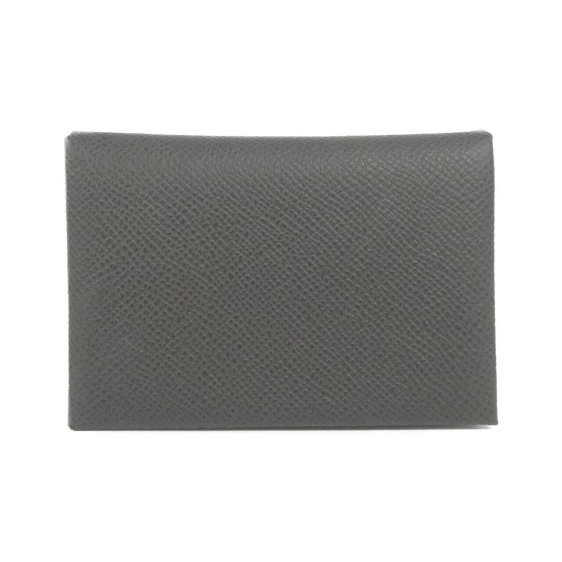 Hermes Calvi Duo 083035CK Wallet/Coin Case: --- Catalog ---Category: SizeSize (HxWxD): 7cm x 10.5cm x 1.5cm / 2.75'' x 4.13'' x 0.59''Category: DesignType: Coin purse/coin caseColor: GraphiteGender: Men,WomenMaterial: Epsom leather Category: Ge
