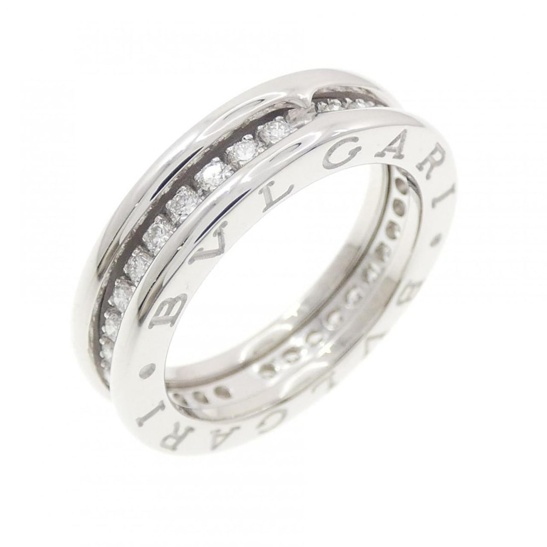 Bvlgari B.zero1 1-band ring: --- Catalog ---Category: SizeUS Size: 5.5Brand Size: 50Category: DesignType: Band ringStone: DiamondGender: WomenMaterial: White gold (18K)Category: GeneralBrand: Bvlgari--- Item List ---Section: Cond