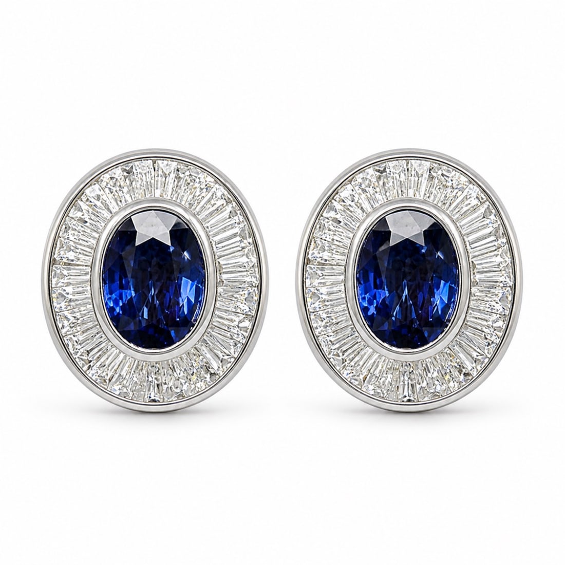 Platinum Sapphire & Diamond Earrings: Weighing 13.9 grams. Set with 2 Sapphires app. 4.30 Ct. (Stamped weight). Along with 2.37 Ct. of Diamonds. F-G Color, VVS-VS Clarity. 0.75 inches in length.