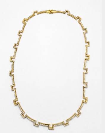 5.19 Ct. Diamond Necklace: 18K White Gold necklace featuring a total weight of 5.19 Ct. of Round Brilliant and Baguette cut diamonds. F-G Color, VS Clarity. 16 inches.