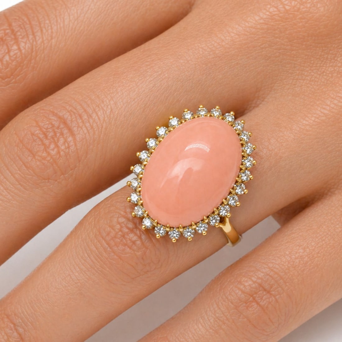 1960s 18K Yellow Gold Coral & Diamond Ring: Authentic 1960s vintage; 18K Yellow Gold; Natural Coral center accented by brilliant-cut diamonds.