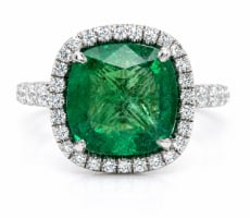 Platinum 3.50 Ct. Emerald & Diamond Ring: 3.50 Ct. Natural Emerald center; Solid Platinum; Tapered baguette and round diamond accents.