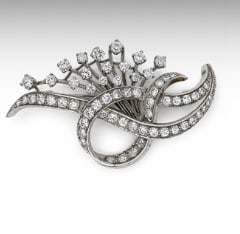 Art Deco Platinum 4.20 Ct. Diamond Brooch: 4.20 Ct. total diamond weight; Solid Platinum; Classic Art Deco openwork design.