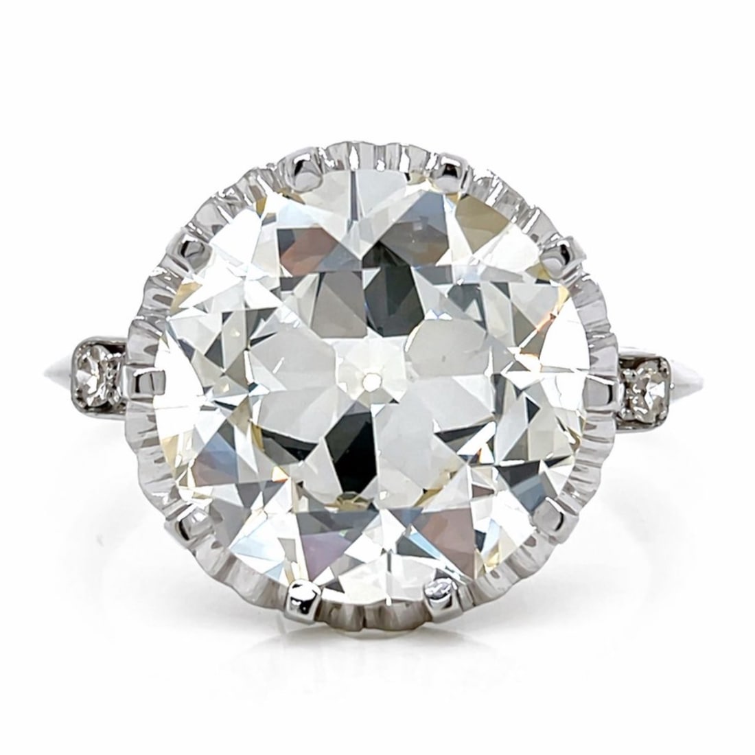 Art Deco Platinum GIA 5.53 Ct. Ring: Genuine Art Deco; GIA Certified 5.53 Ct. center diamond; Solid Platinum mounting with era-specific filigree.