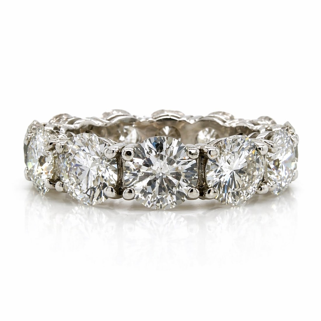 Platinum 6.20 Ct. Diamond Eternity Band: Full eternity wrap; Solid Platinum; 6.20 Ct. total weight in matched brilliant diamonds.