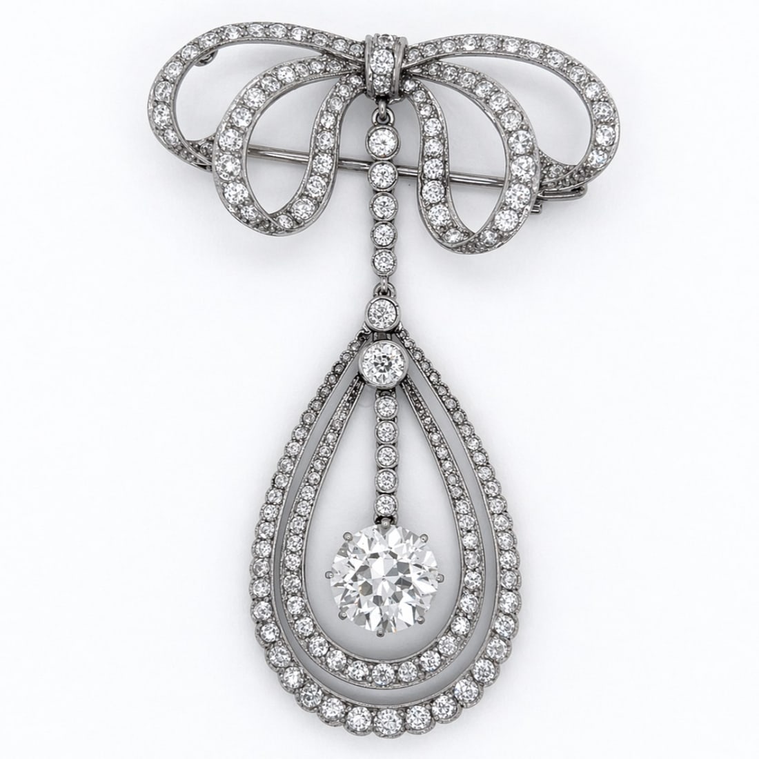 Edwardian Platinum Diamond Brooch: Genuine Edwardian period; Platinum over Gold; Fine milgrain and lace-work set with diamonds.