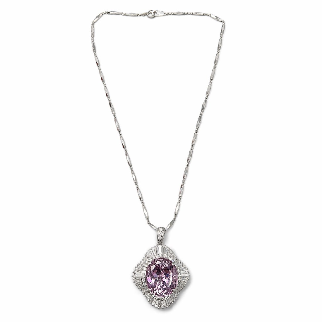 Platinum Kunzite & Diamond Necklace: Solid Platinum; Significant Kunzite drop pendant; Accented with high-clarity diamonds.