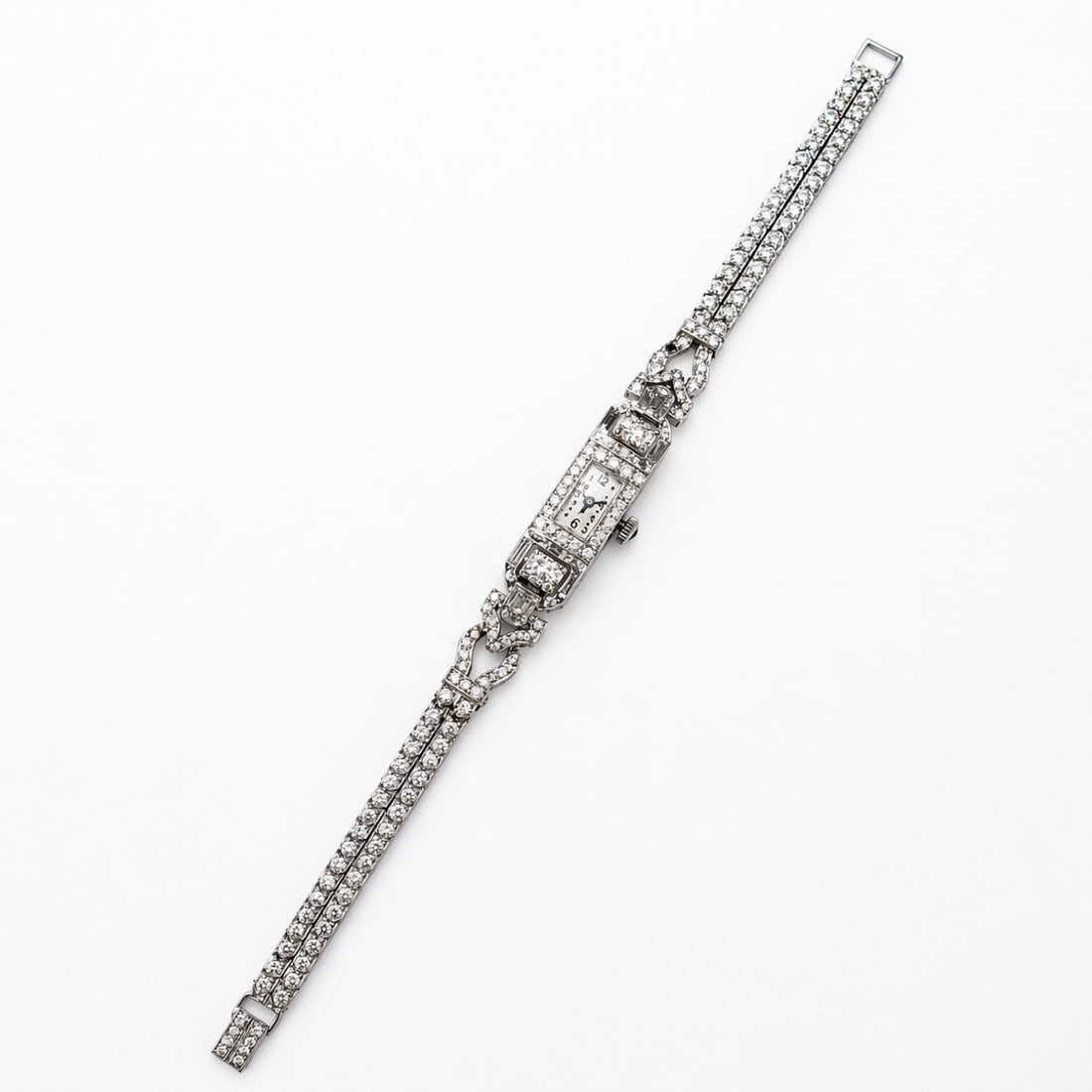 MATHEY TISSOT Art Deco Platinum Watch: Authentic Mathey Tissot; Platinum case and bracelet fully set with Art Deco diamonds; Manual wind.