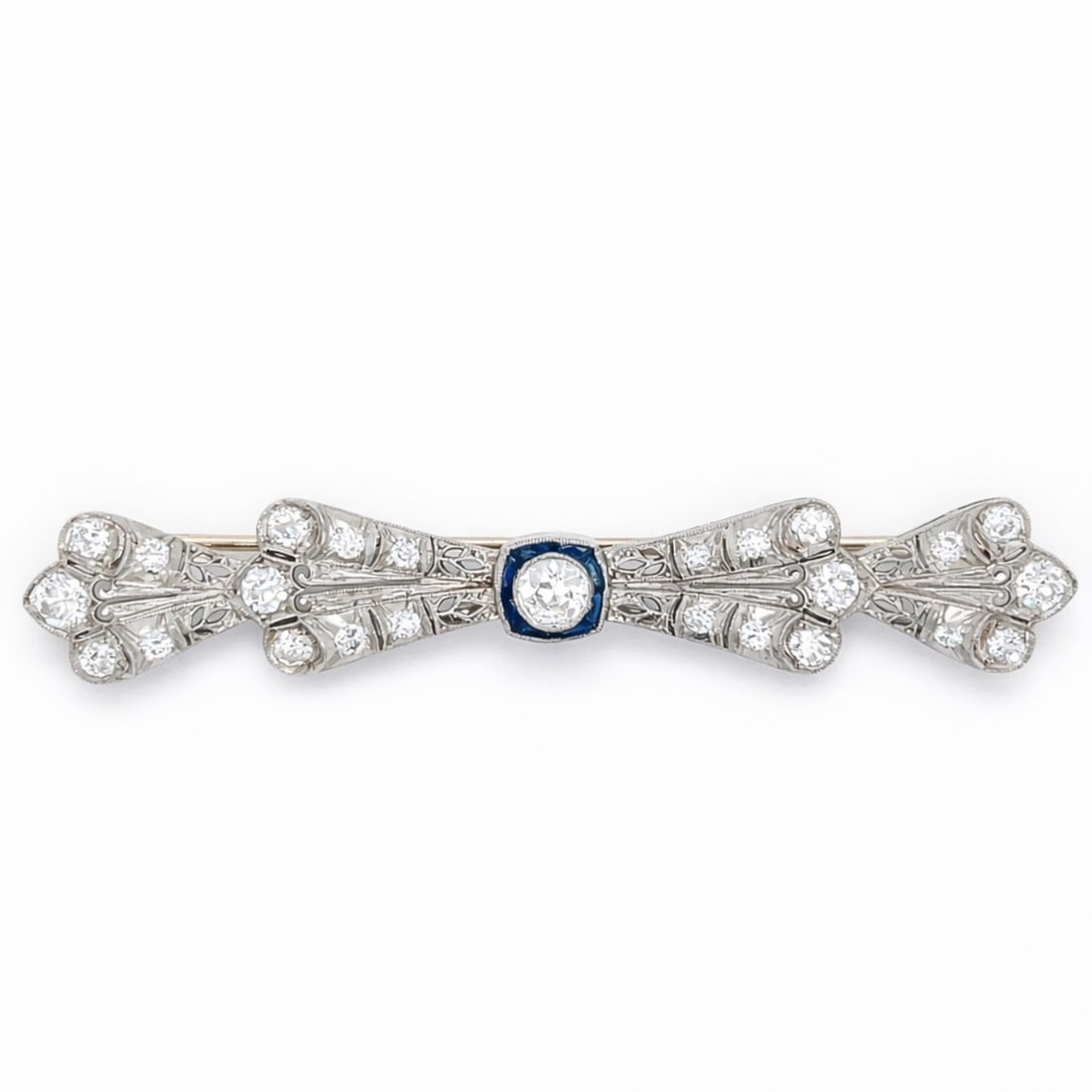 Art Deco Platinum Diamond & Sapphire Brooch: Original Art Deco; Solid Platinum; Diamond pavé with Calibre-cut natural Sapphire accents.