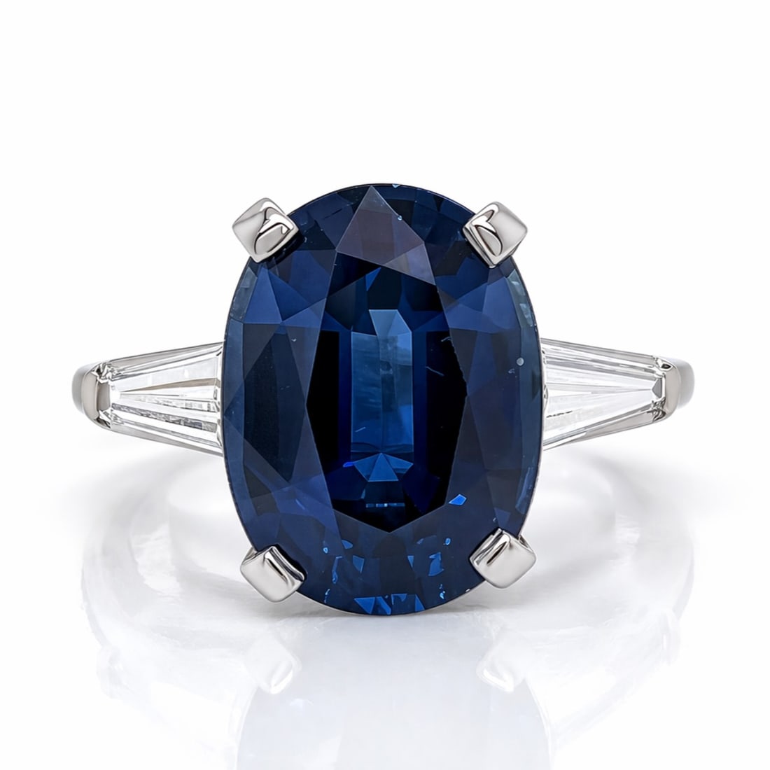 Platinum 6.25 Ct. Sapphire & Diamond Ring: Solid Platinum; 6.25 Ct. Blue Sapphire center; Premium diamond mounting.