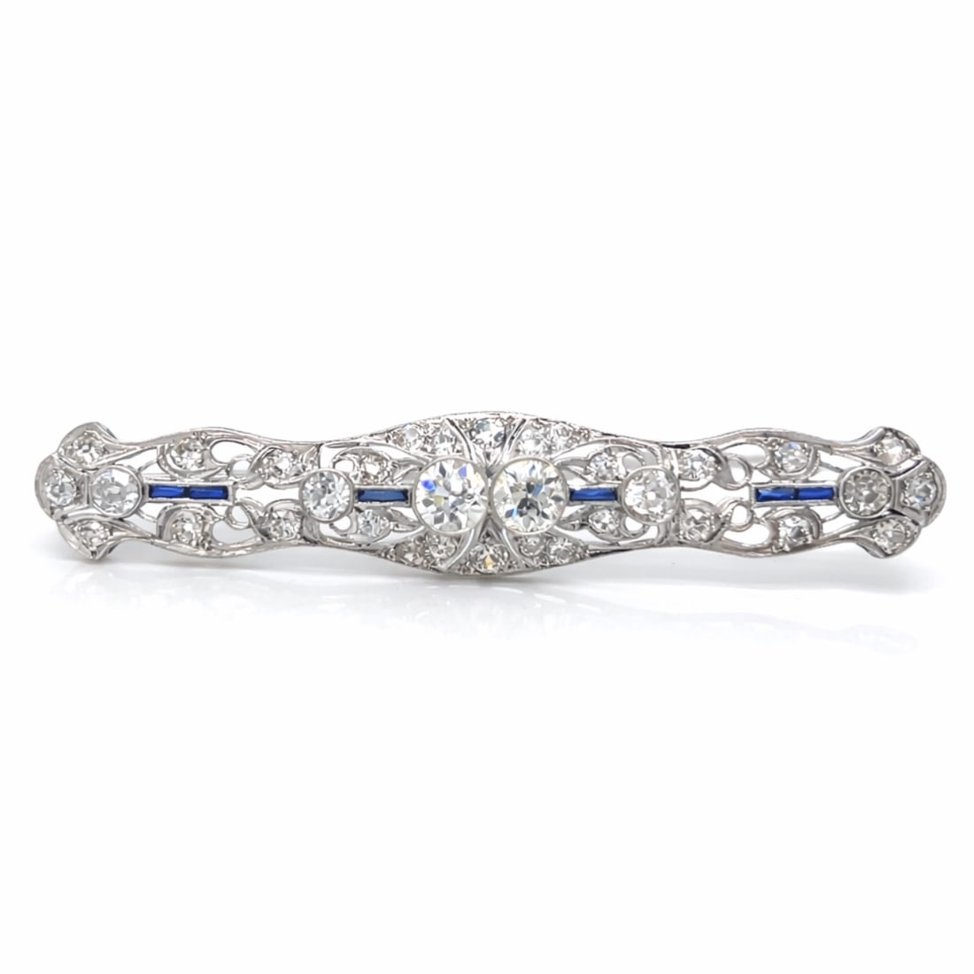 Art Deco Platinum 3.50 Ct. Diamond/Sapphire Brooch: Authentic Art Deco; Platinum gallery set with 3.50 Ct. of Diamonds and Calibre-cut Sapphire accents.