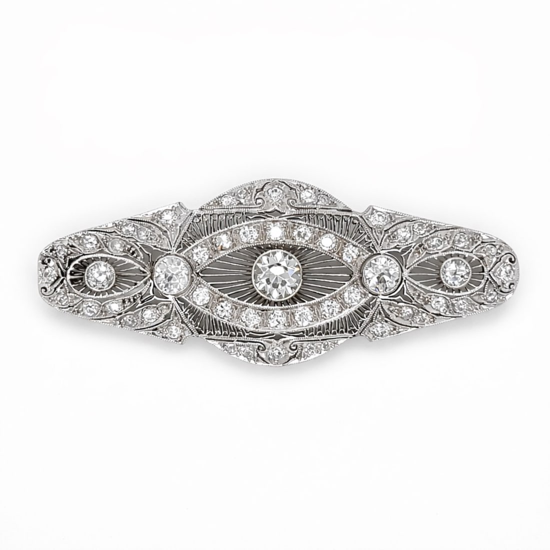 Art Deco Platinum 4.60 Ct. Pendant/Brooch: Convertible design; Art Deco Platinum filigree set with 4.60 Ct. of diamonds; Wearable as pendant or brooch.